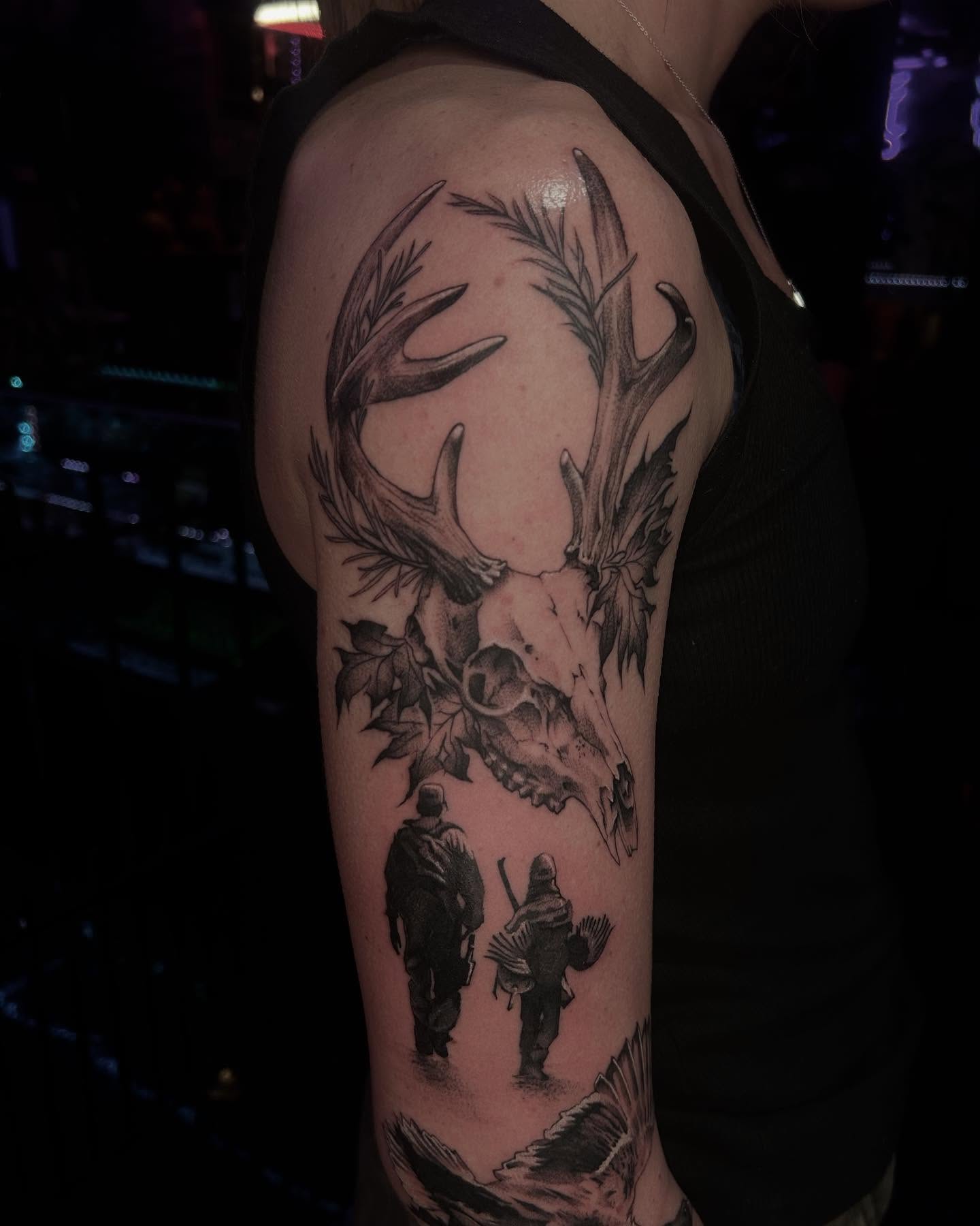Deer skull and hunters realism tattoo on the forearm by Tattoos by Abbey