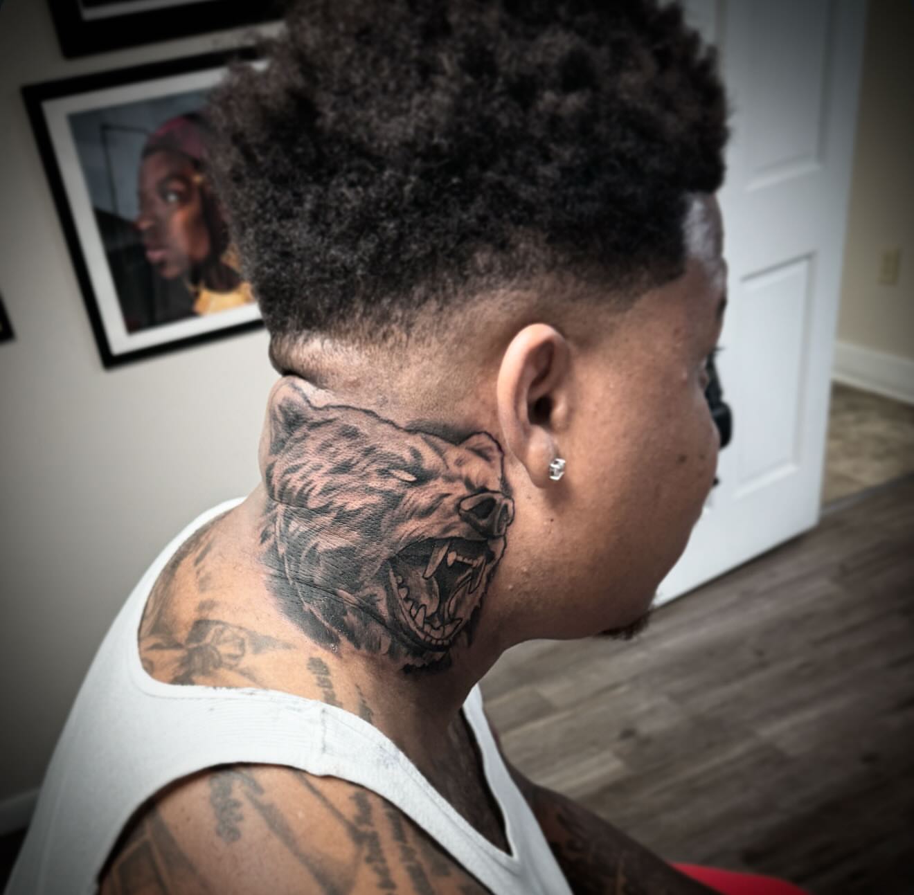 Wolf realism tattoo on the neck by Jared McGee