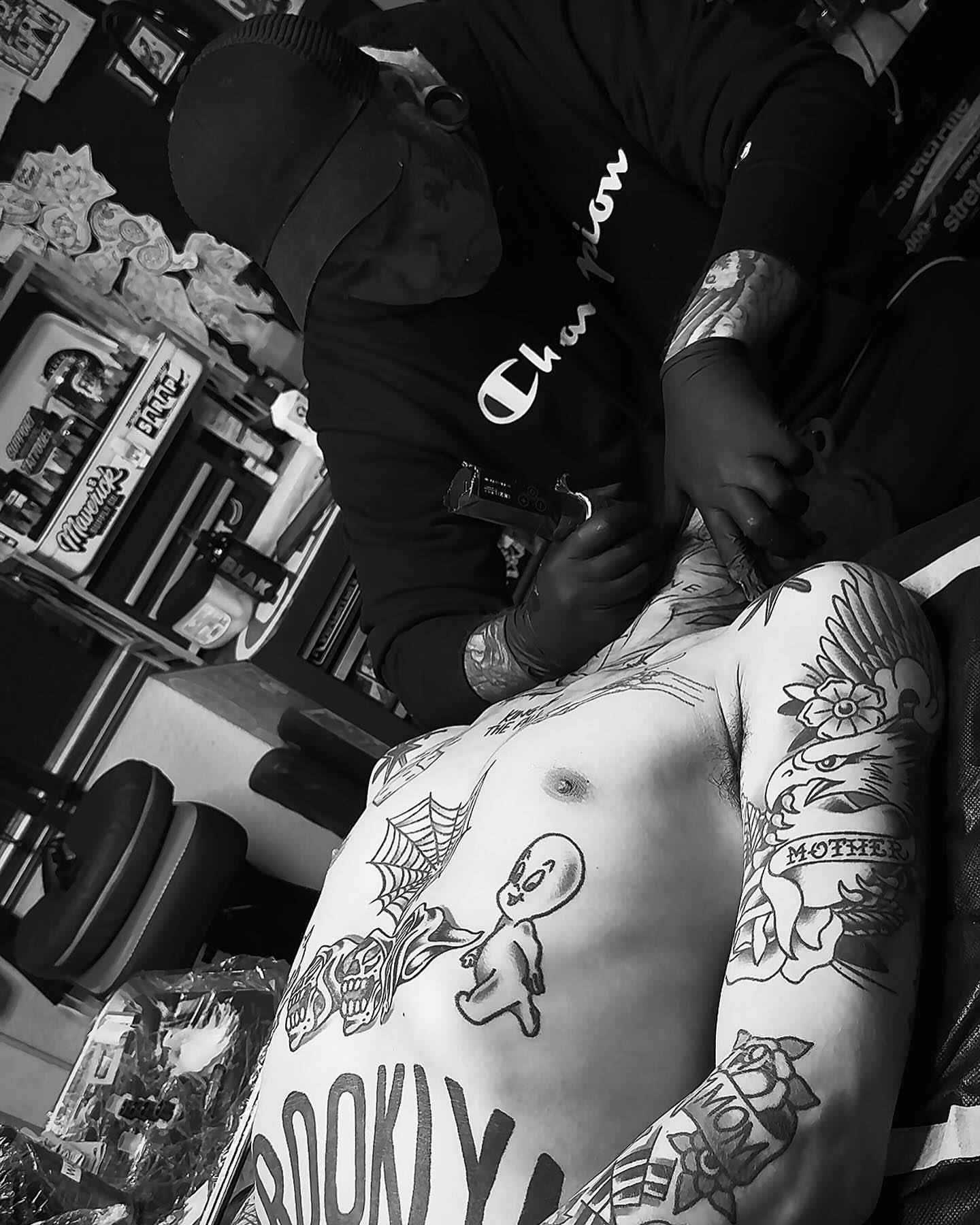 Baby and spider web American traditional tattoo on the chest by C.J. Rued