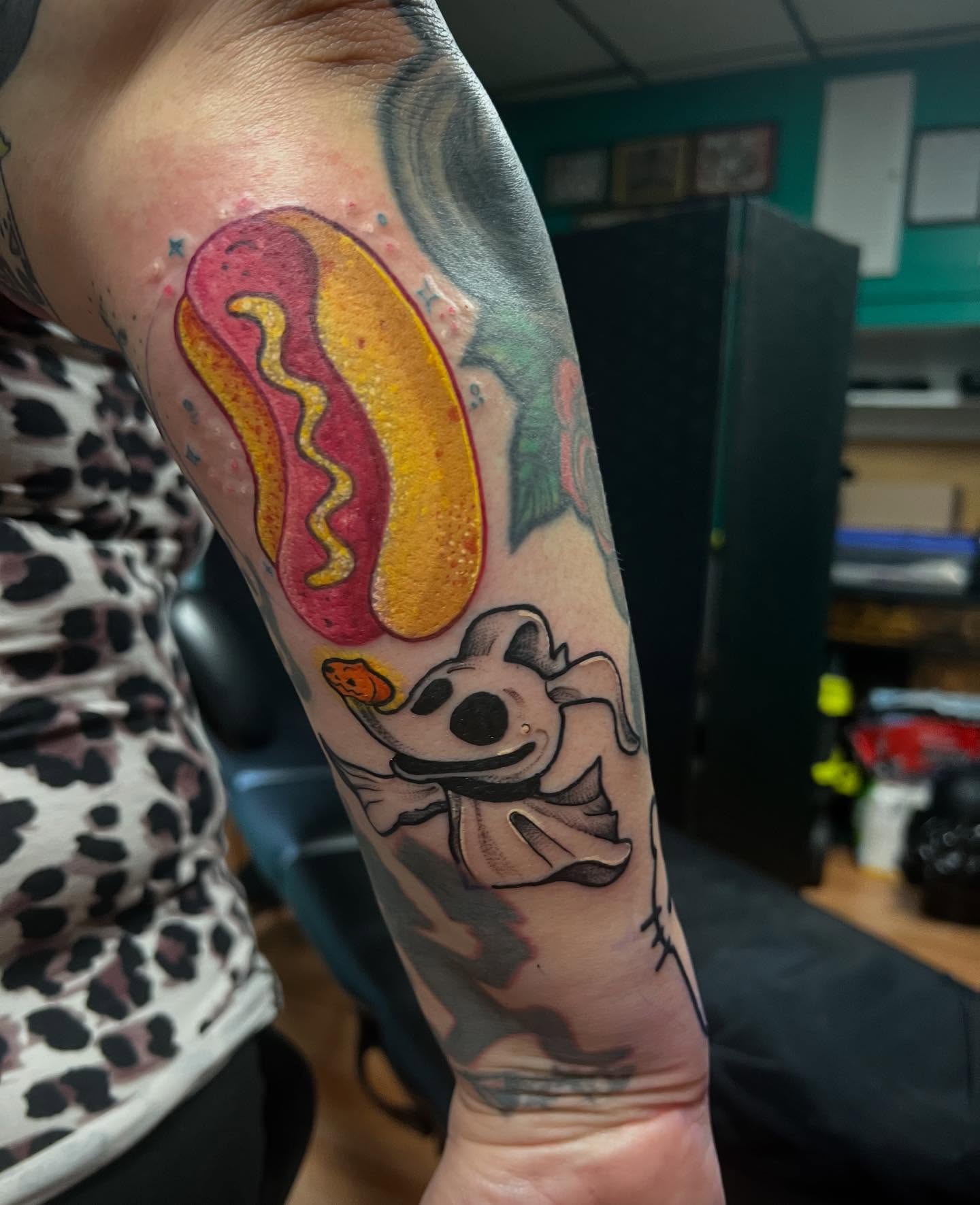 Hot dog American traditional tattoo on the forearm by Katie Sayre