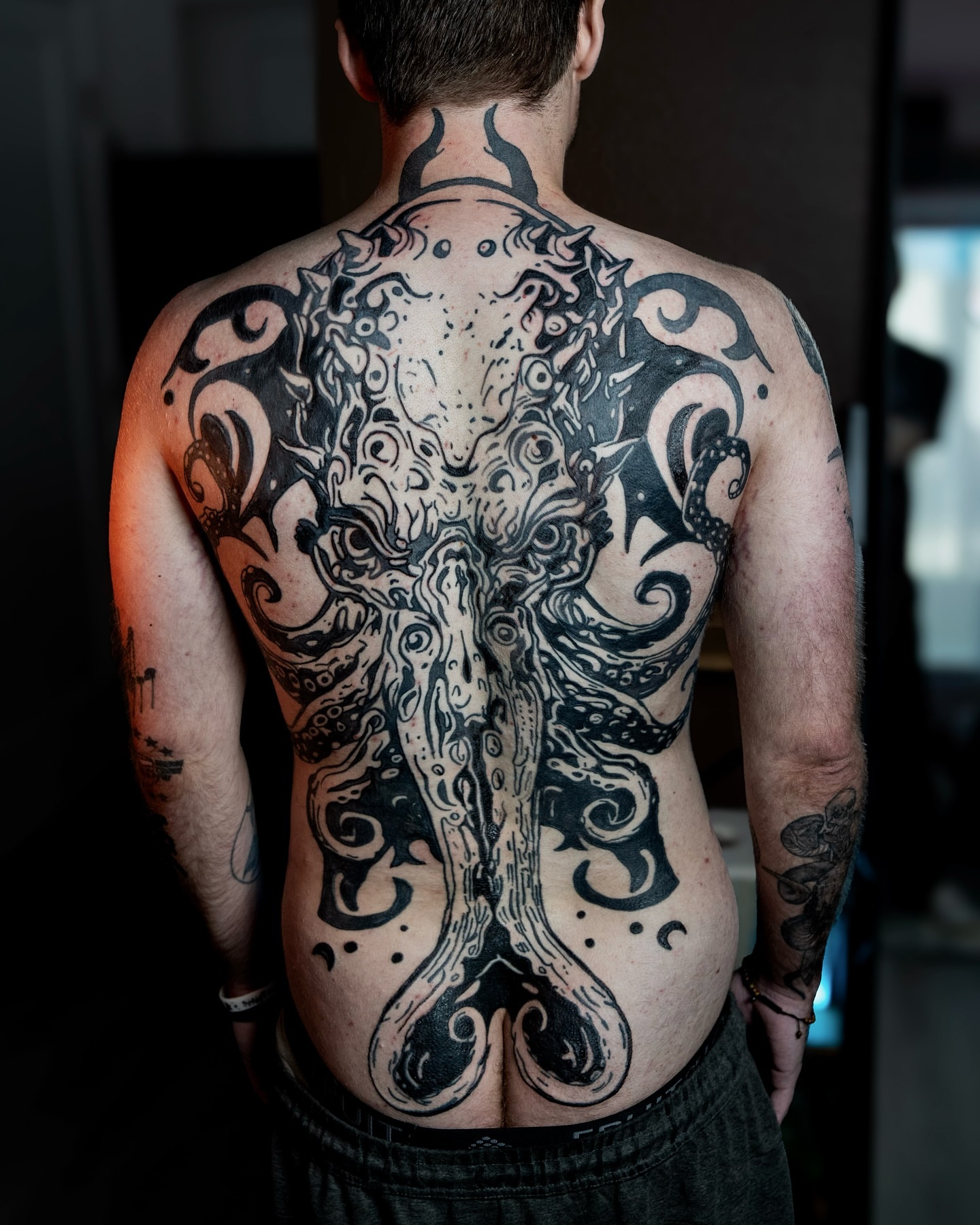 Octopus geometric tattoo on the back by Bwk Dark Art