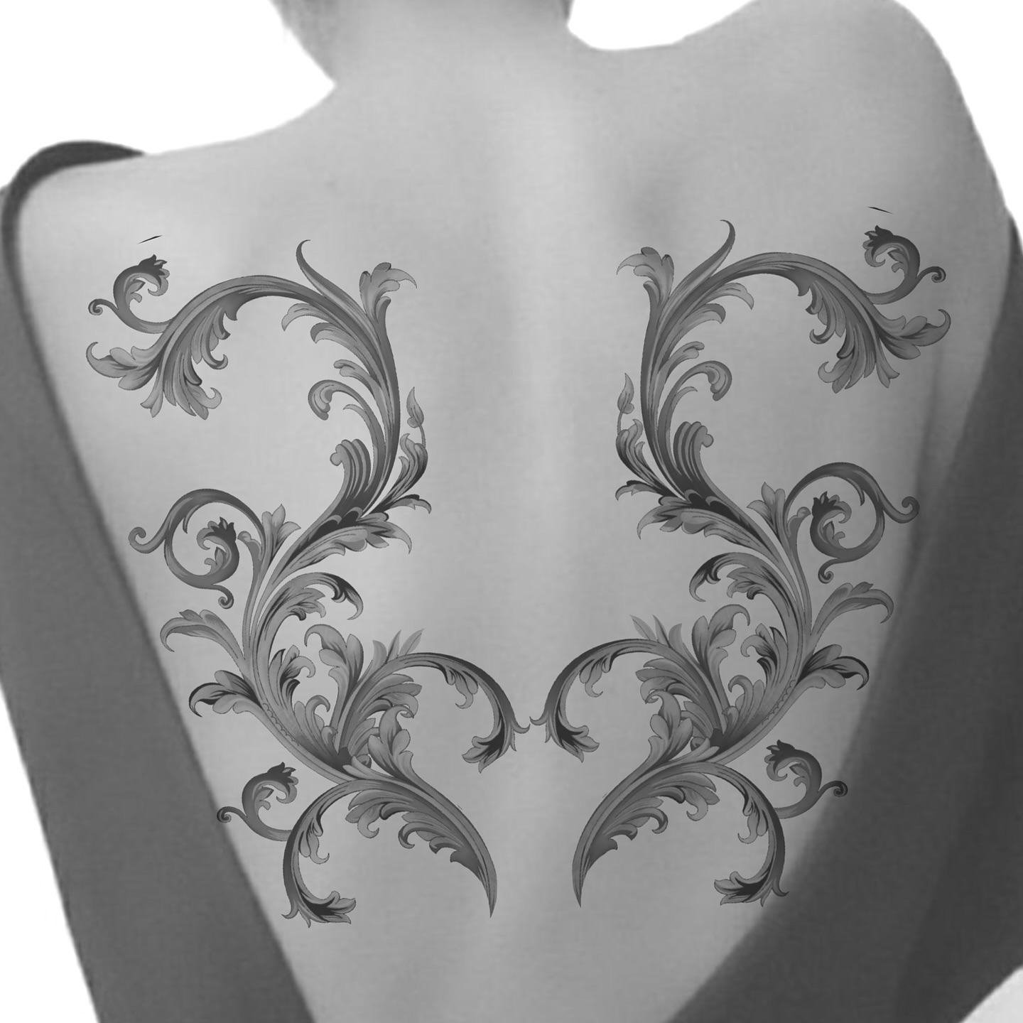 Floral ornamentation ornamental tattoo on the back by Rachel