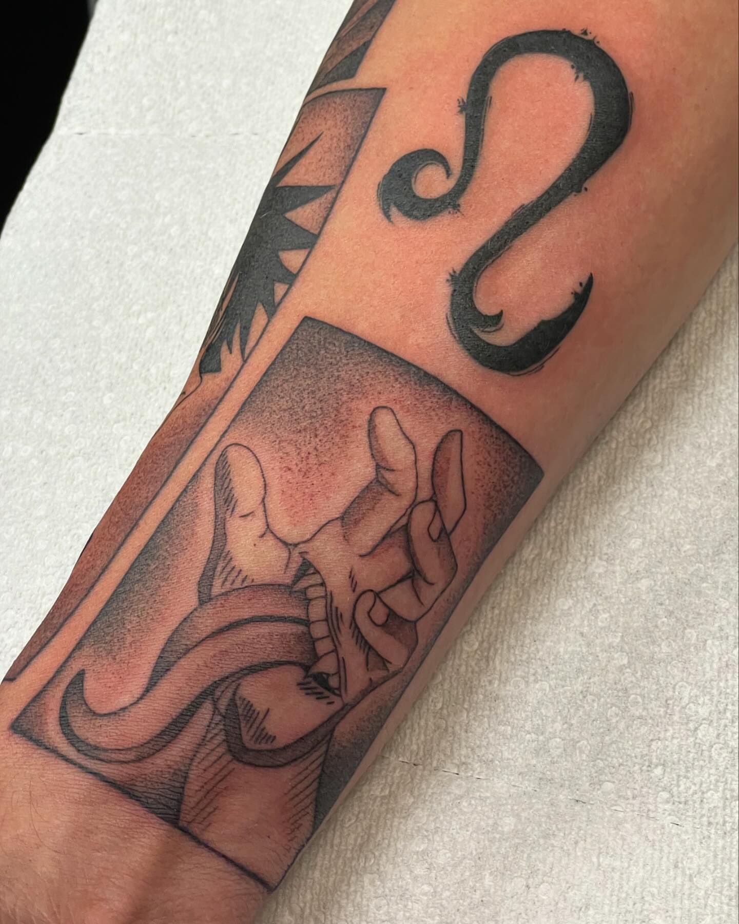 Hands and snake realism tattoo on the forearm by Jesse (Dreadzilla)