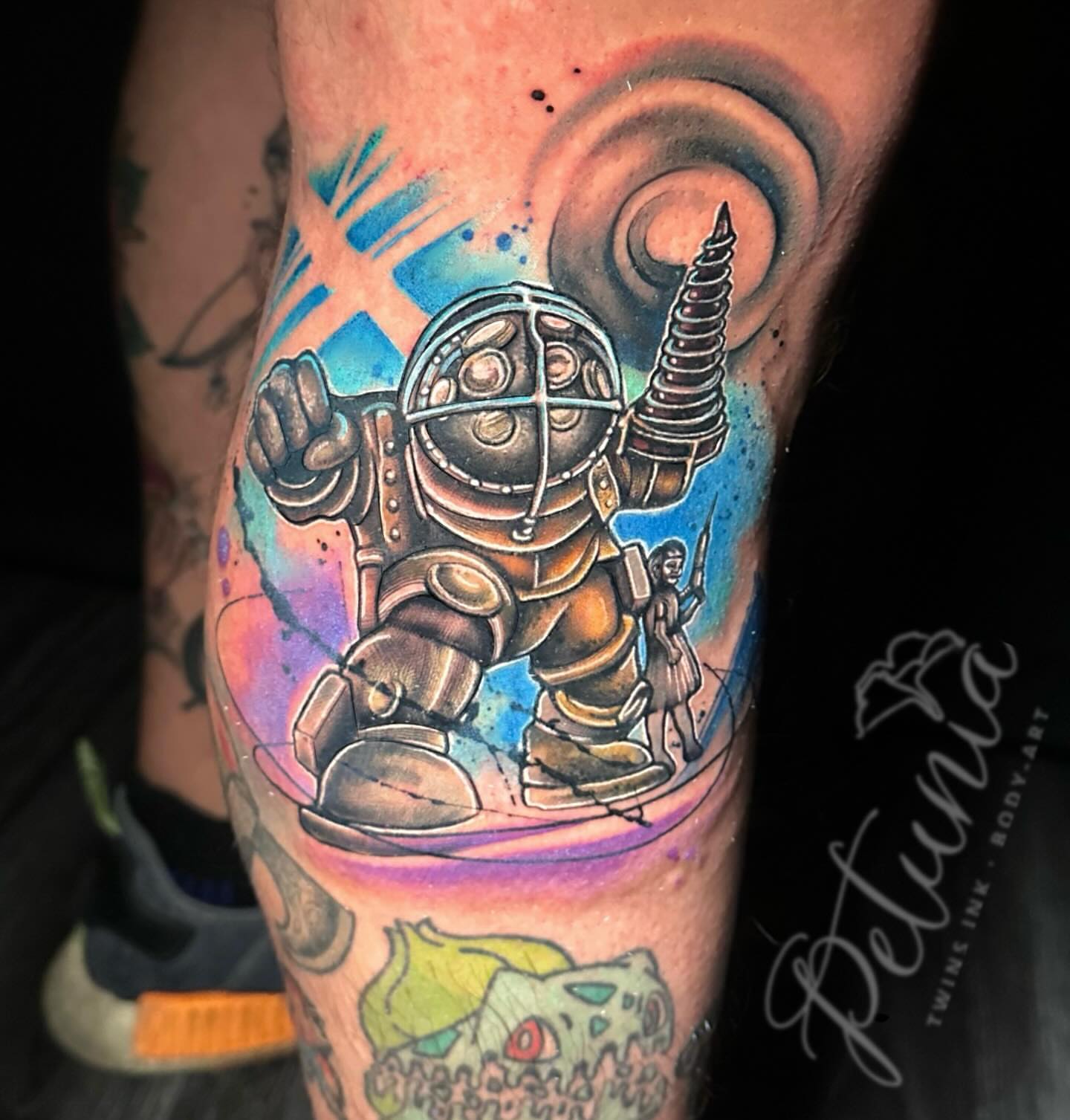 Space suit watercolor tattoo on the forearm by Alena Petunia