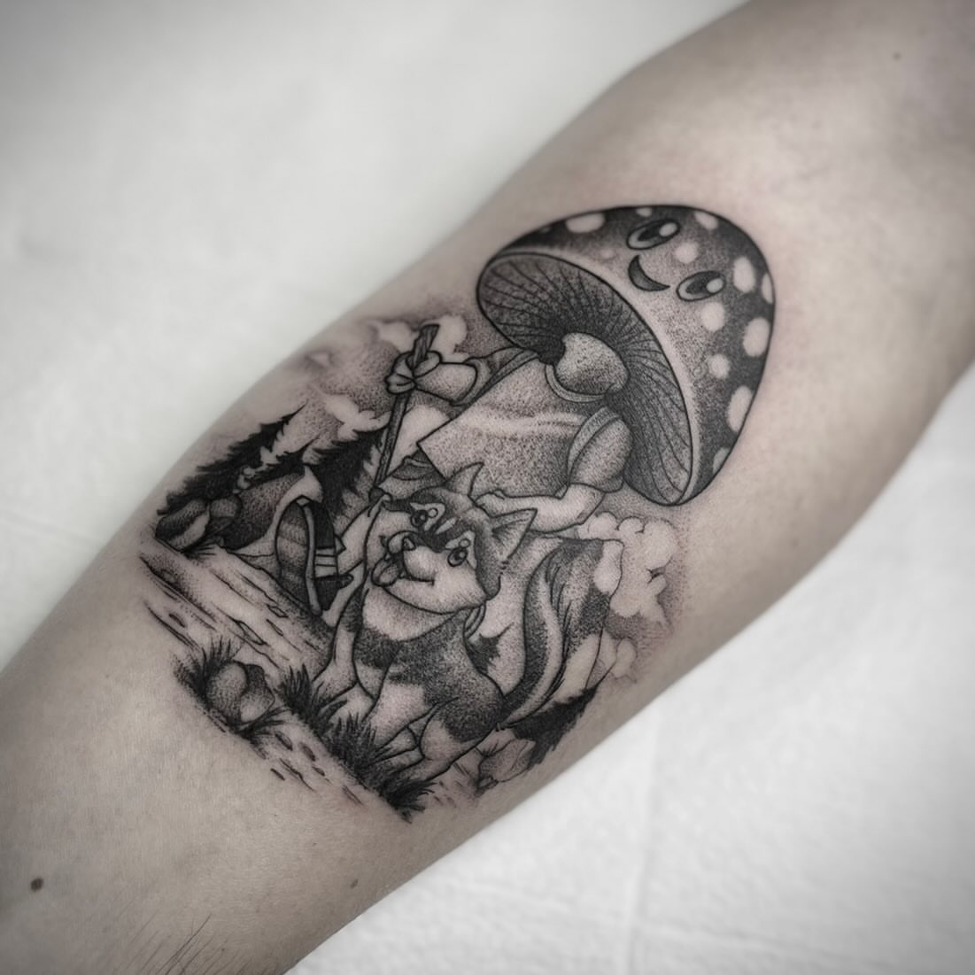 Wolf and mushroom realism tattoo on the forearm by Martha Gual π€ East ATX Tattooer