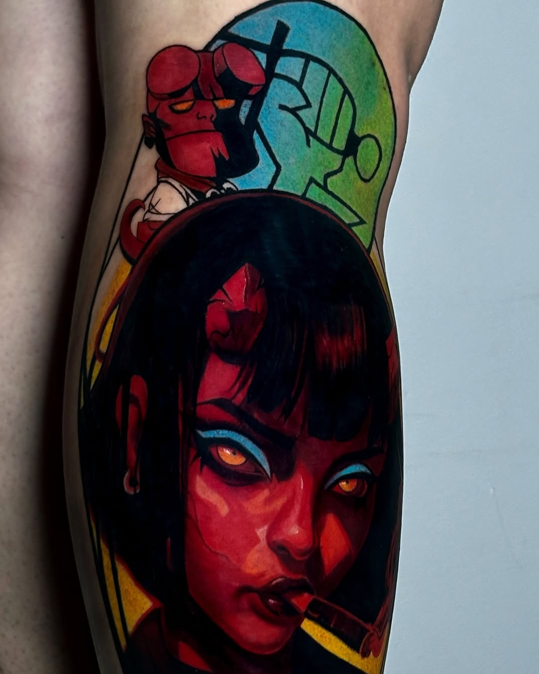 Hellboy and a demon woman neo-traditional tattoo on the forearm by ✨ Tattoo Artist