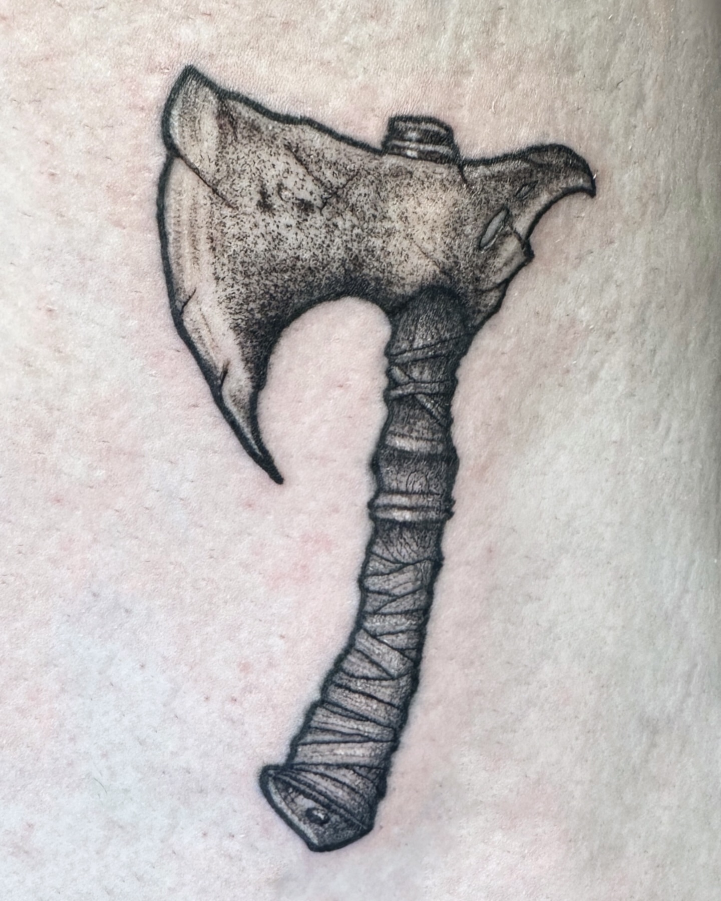 Battle axe black and grey tattoo on the forearm by Tattoo Artist ⚔️ San Diego, CA
