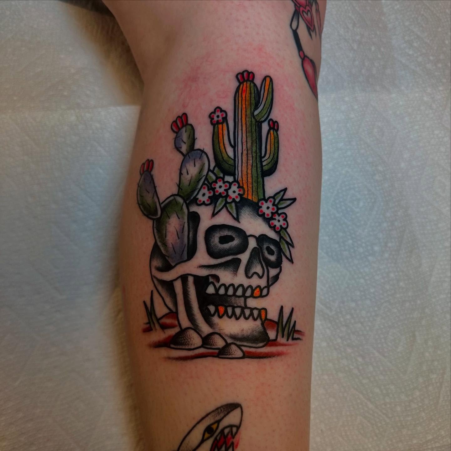 Skull with cacti American traditional tattoo on the forearm by Noah Diffenderfer, Phoenix, Arizona