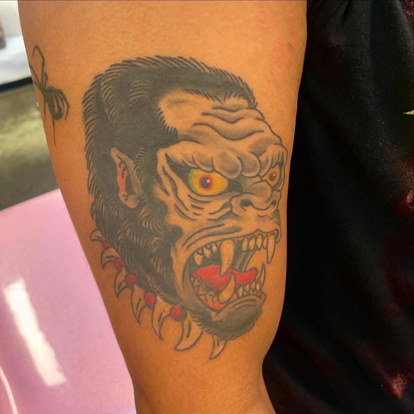Gorilla head American traditional tattoo on the forearm by Seth Griffin