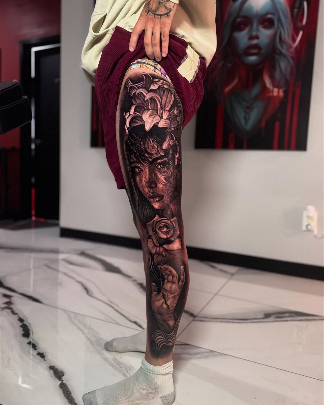 Surrealism tattoo on the leg by Mia