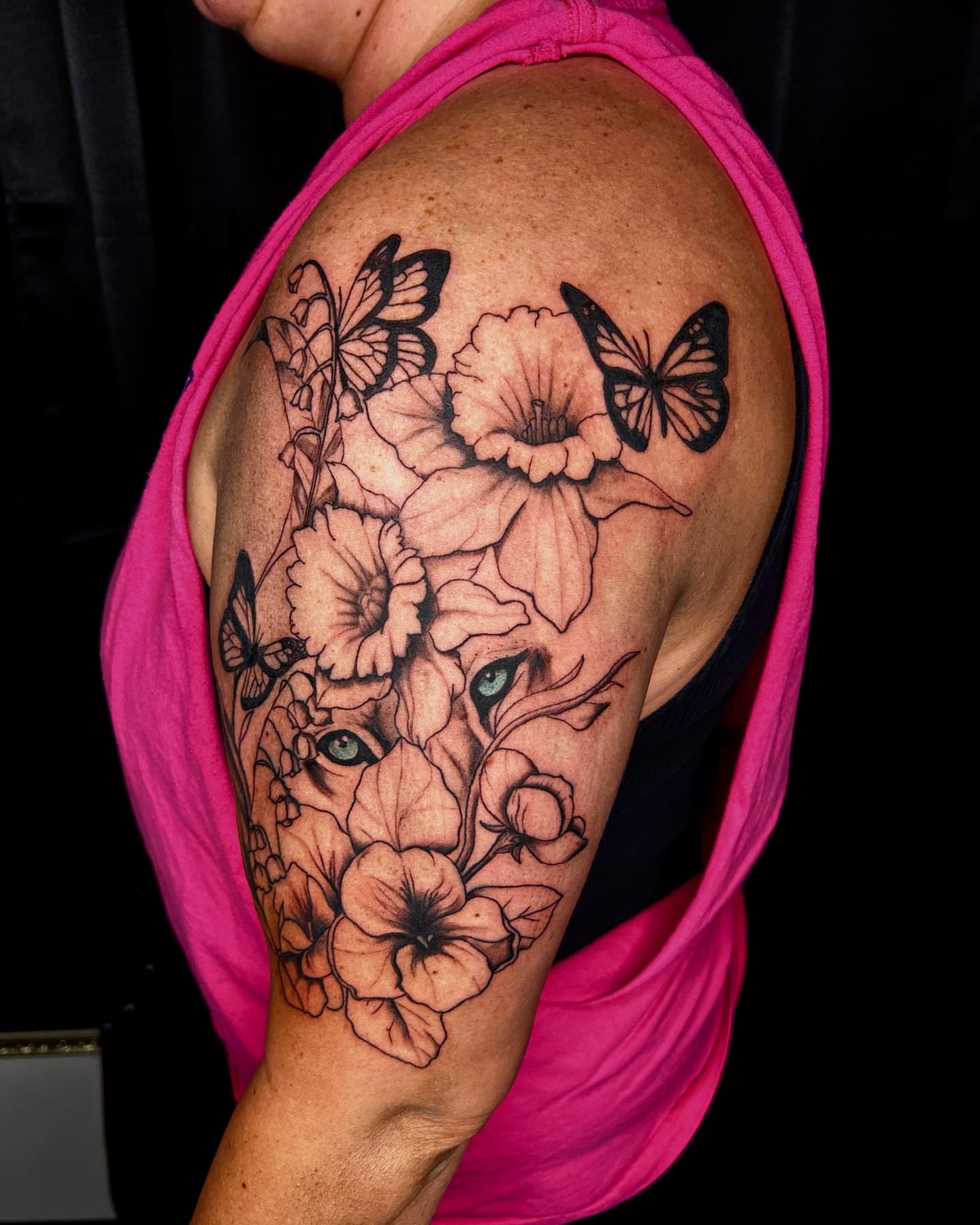 Flowers and butterflies realism tattoo on the shoulder by Cleveland Tattoo Artist, Cleveland, Ohio