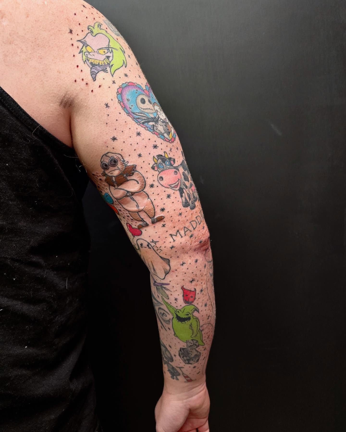 Cartoon characters dotwork tattoo on the forearm by Diana Guillette