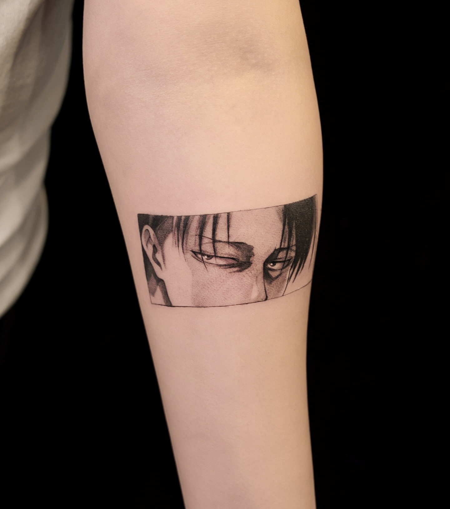Anime character realism tattoo on the forearm by Gen Li