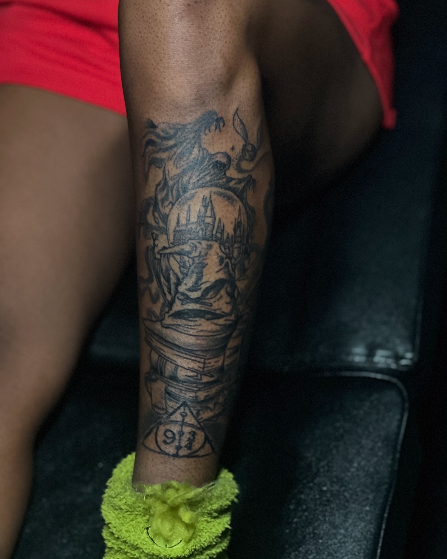 Castle and dragon black and grey tattoo on the forearm by Emac, Baltimore, Maryland