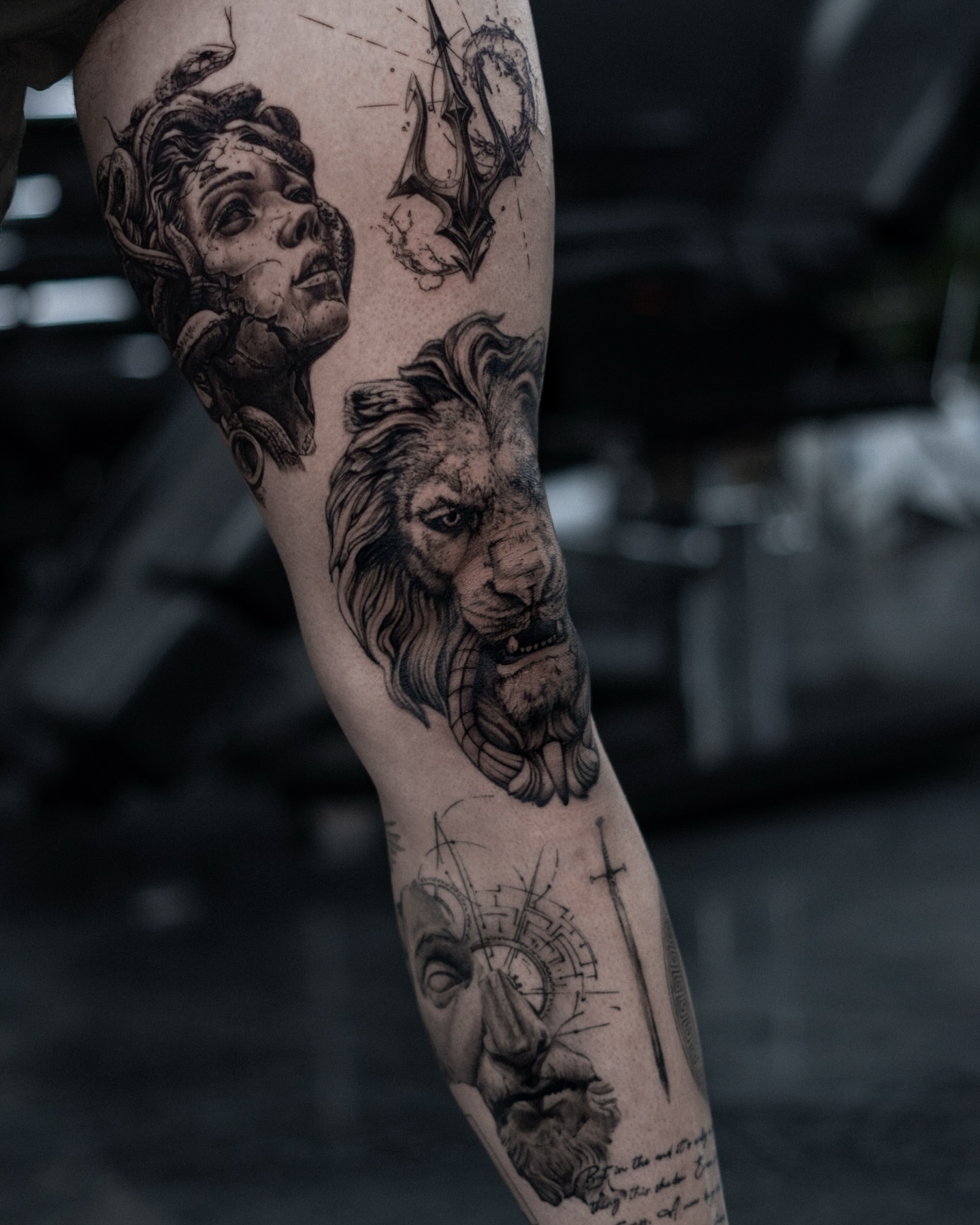 Lion and woman realism tattoo on the forearm by Ron Alvarez