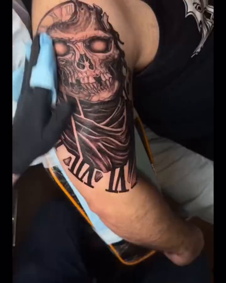 Skull with clock and drapery realism tattoo by Brett Herman, Denver, Colorado