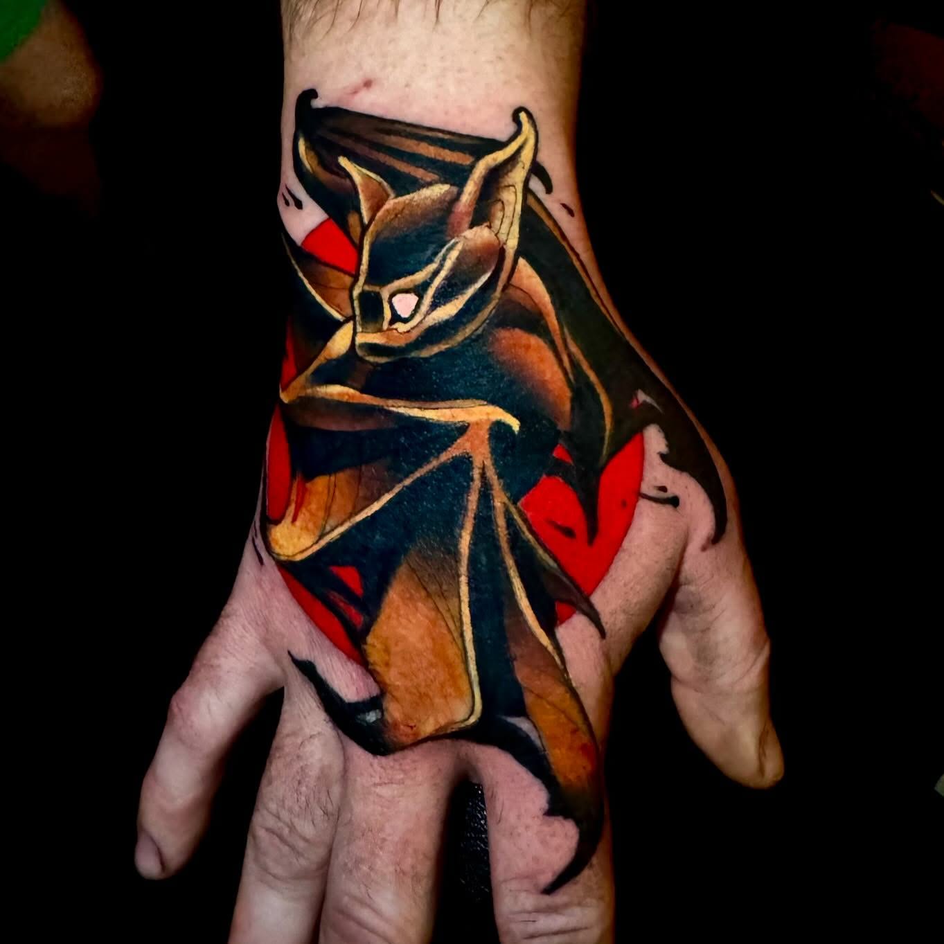 Bat anime tattoo on the hand by Sweets, Nashville, Tennessee