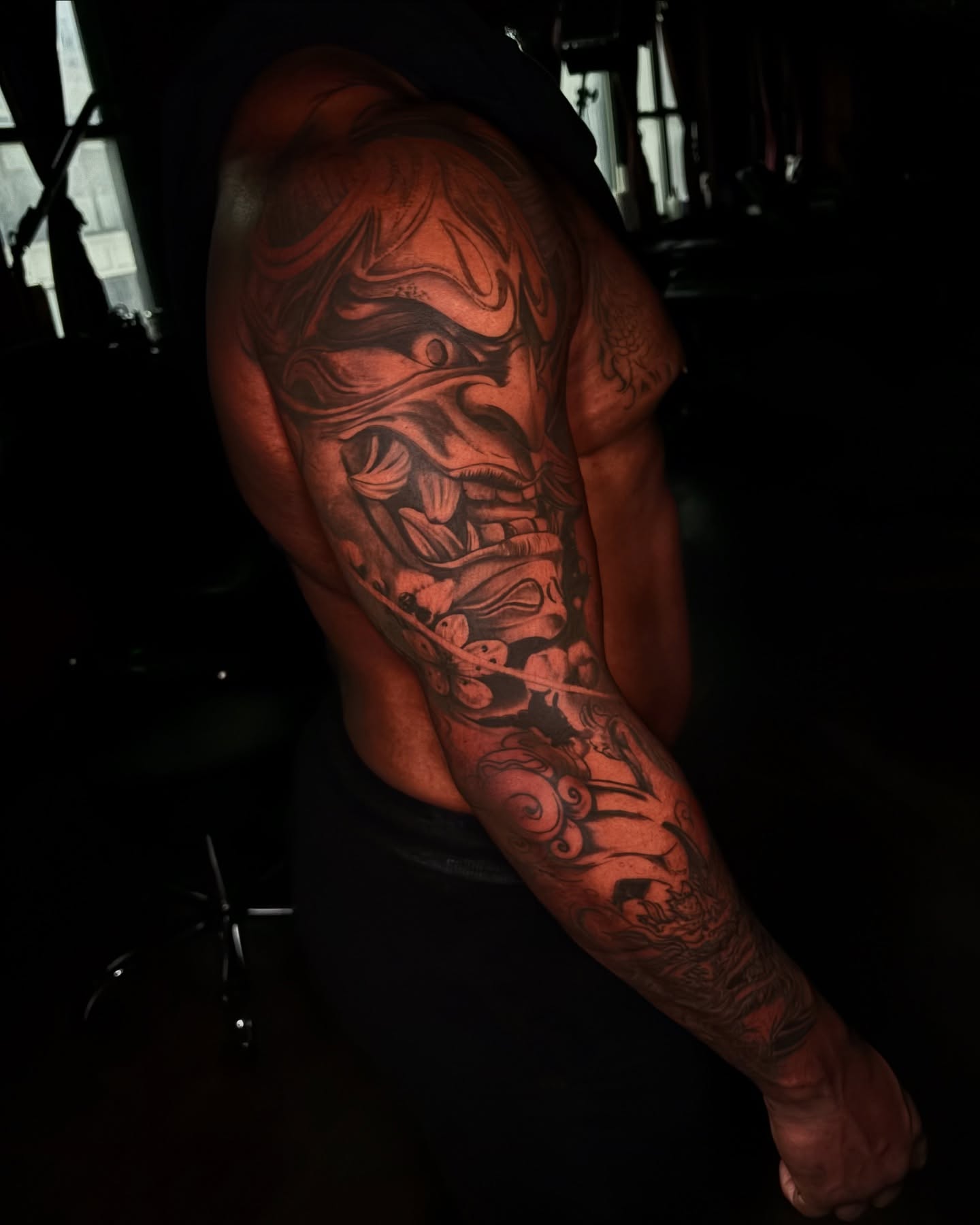 Mask japanese irezumi tattoo on the upper arm by JoannaTattoos