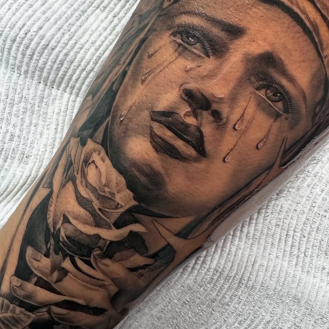 Tattoo by @tinys.tattoos — realism, black_and_grey
