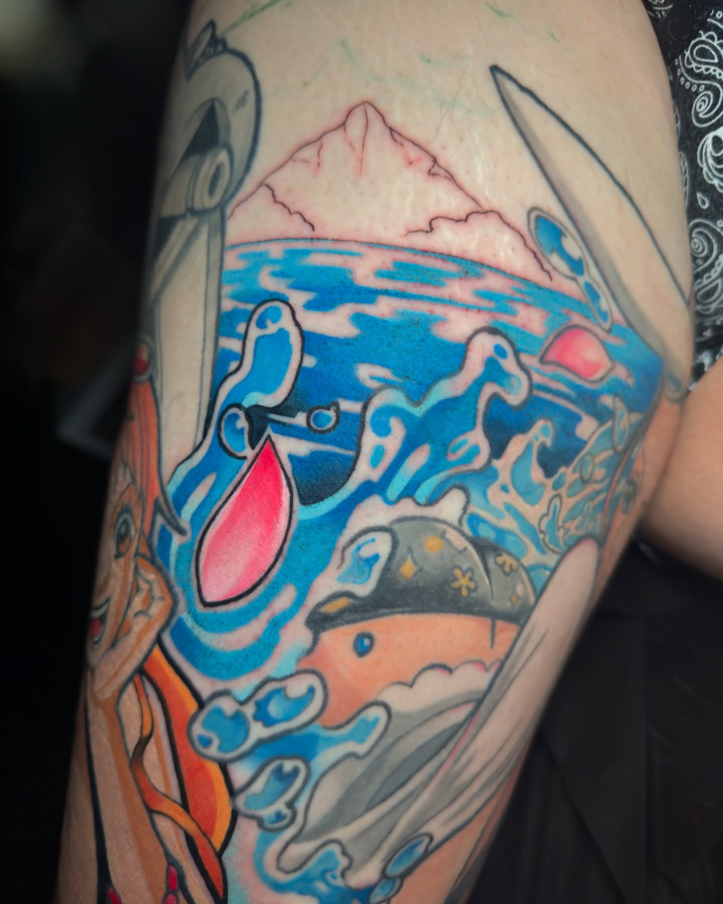 Surfing scene new school tattoo on the forearm by Cristian Romero