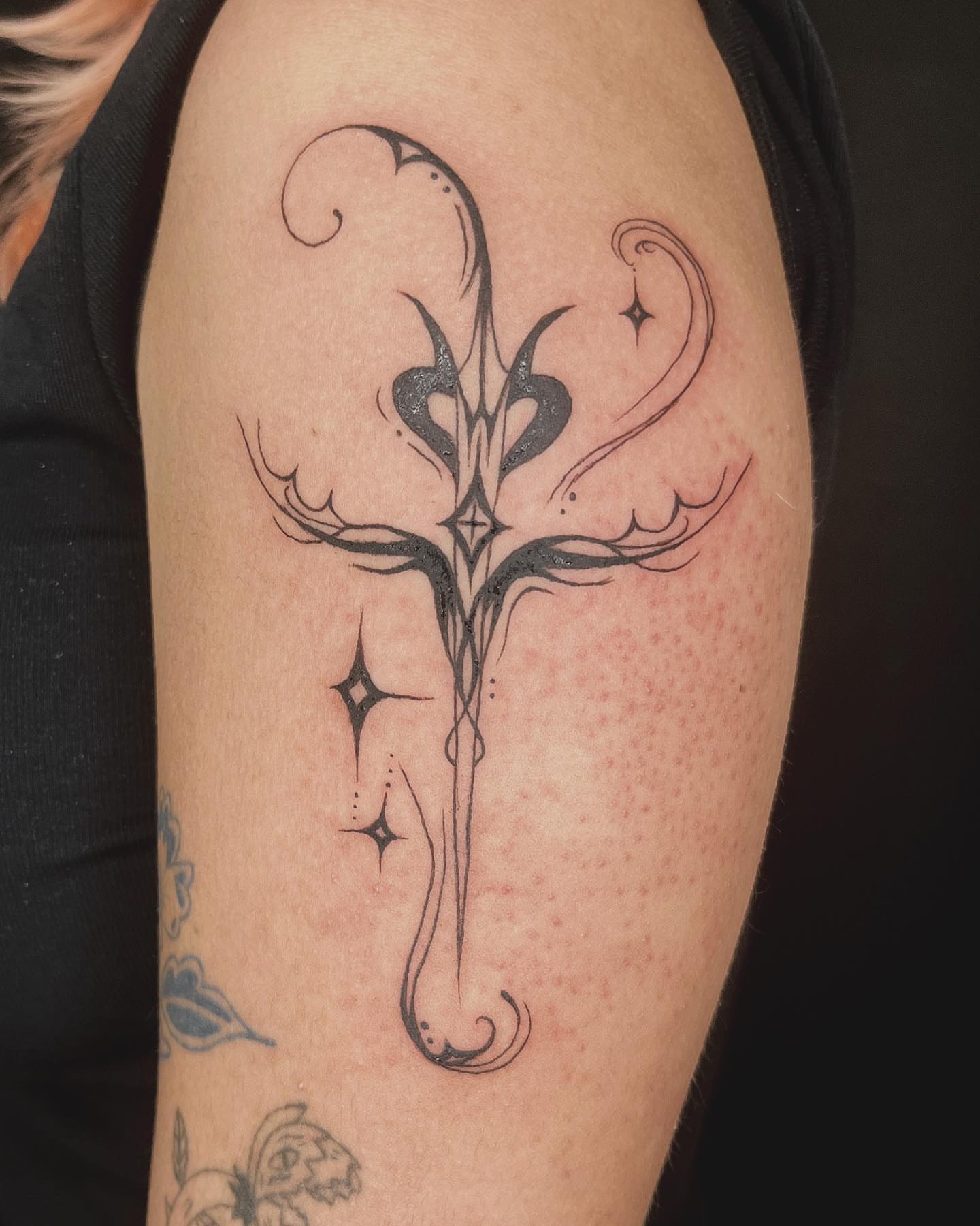 Cross black and grey tattoo on the upper arm by *:・kelly✧*:・゚
