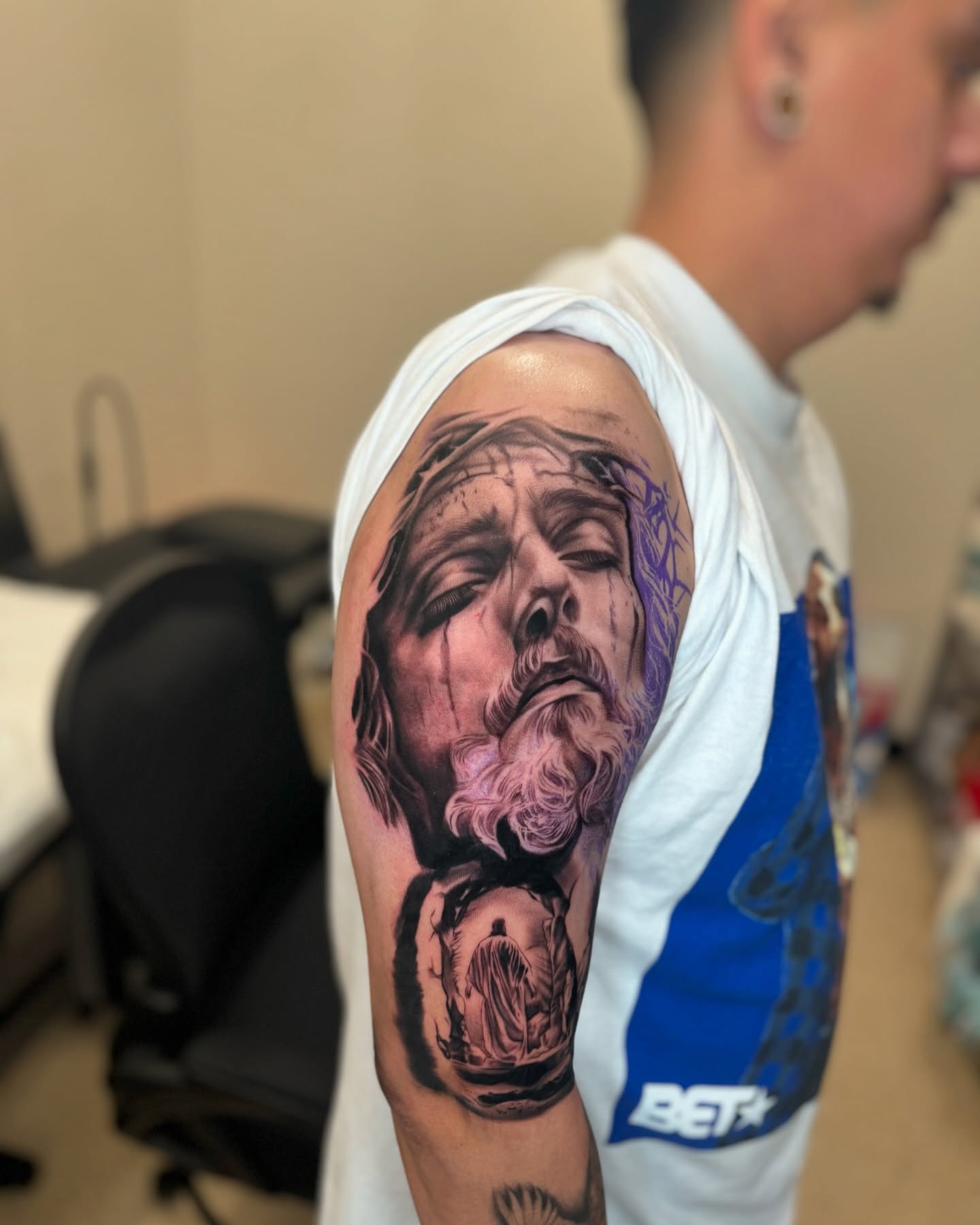 Religious figure realism tattoo on the forearm by Ian Chancellor, Leighton Buzzard, England