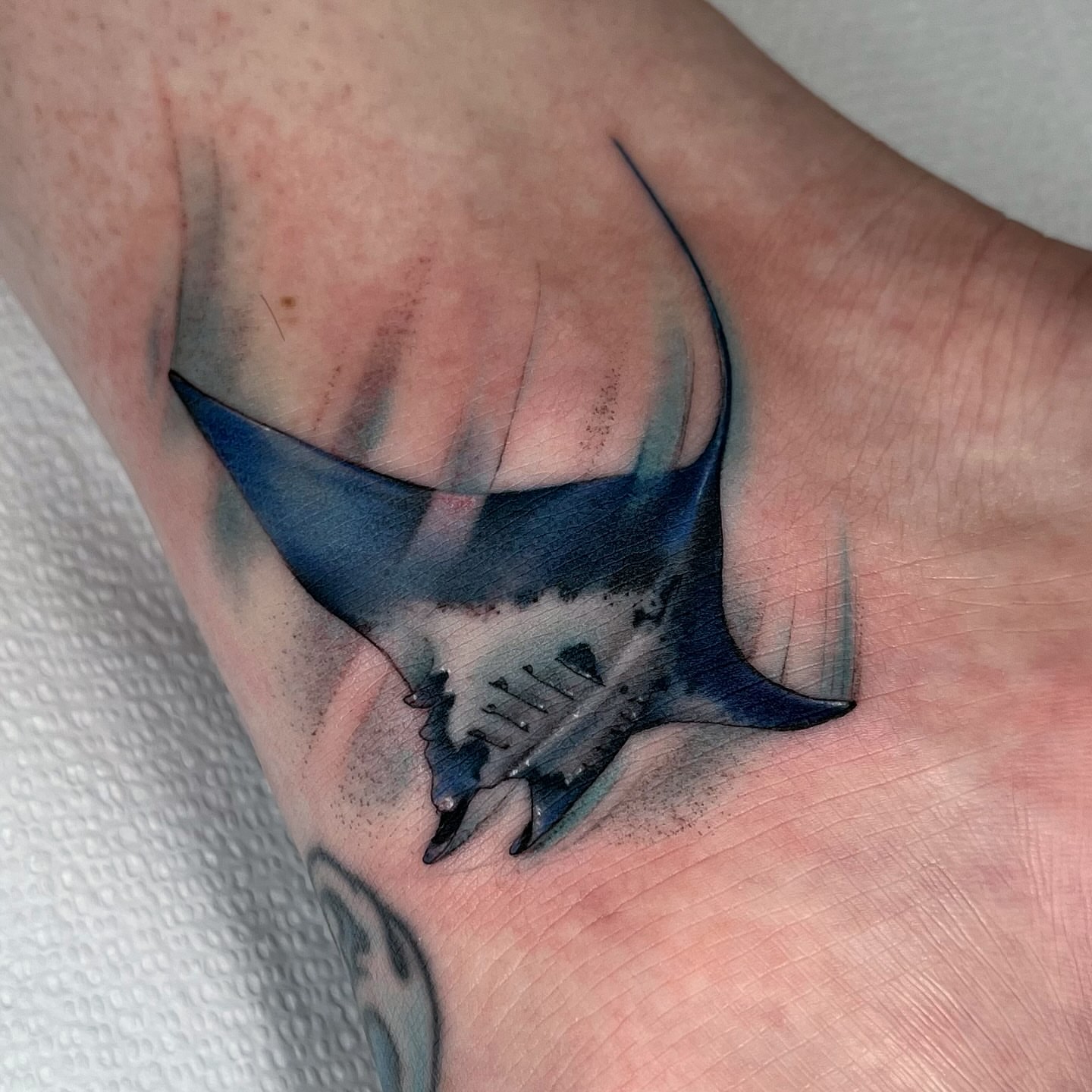 Manta ray realism tattoo on the forearm by Martha Gual π€ East ATX Tattooer