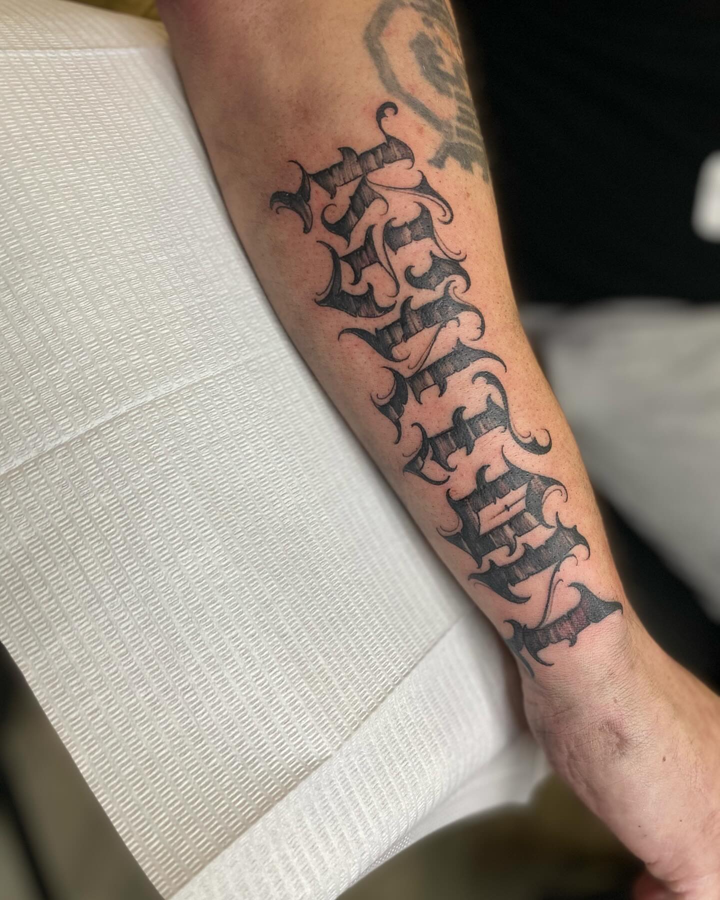 Script lettering lettering script tattoo on the forearm by Chase Skylar Clayton Ogle