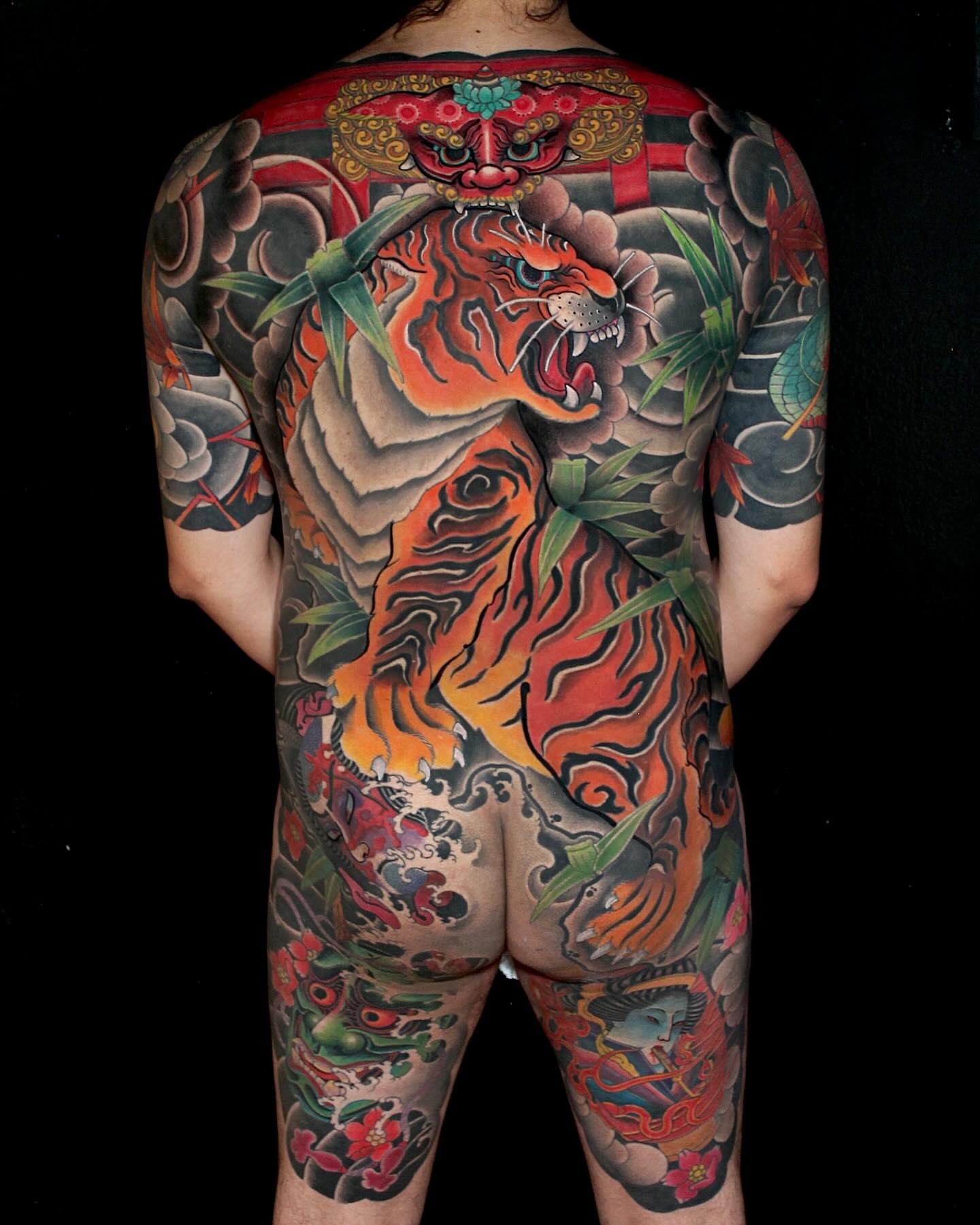 Tiger japanese irezumi tattoo on the back by Alezumie
