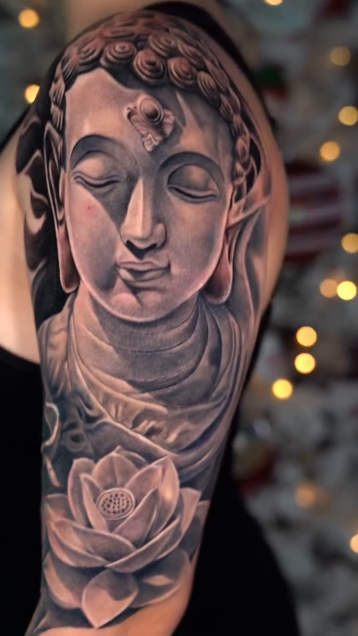 Buddha and lotus flower realism tattoo by Ricardo javier Gil, Dallas, Texas