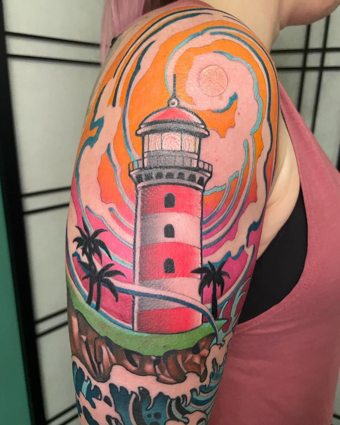 Lighthouse American traditional tattoo on the upper arm by Seattle Tattoo Artist, Bonney Lake, Washington