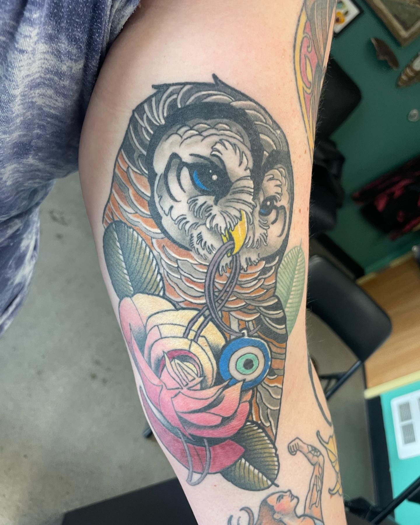 Owl and rose American traditional tattoo on the forearm by Seattle Tattoo Artist, Bonney Lake, Washington