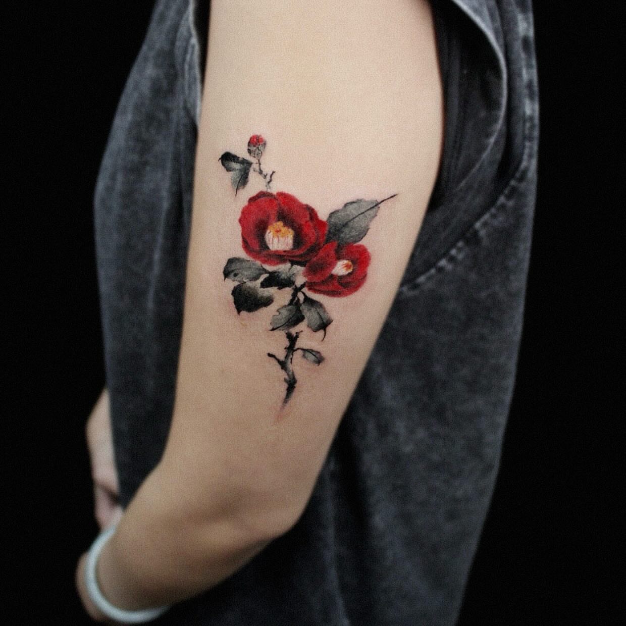 Tattoo by @dyun_tat2 — watercolor