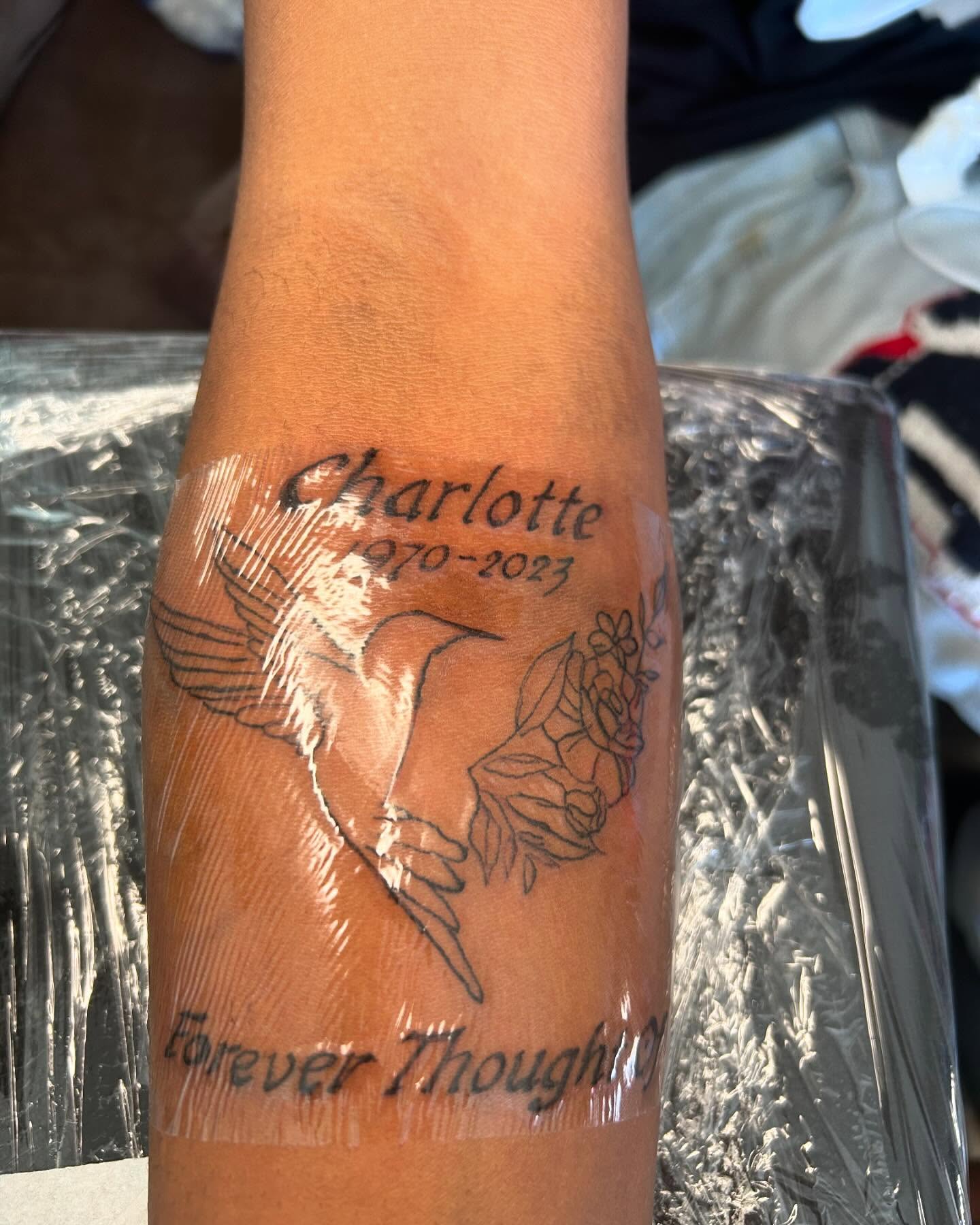 Angels and roses black and grey tattoo on the forearm by Airika Edwards