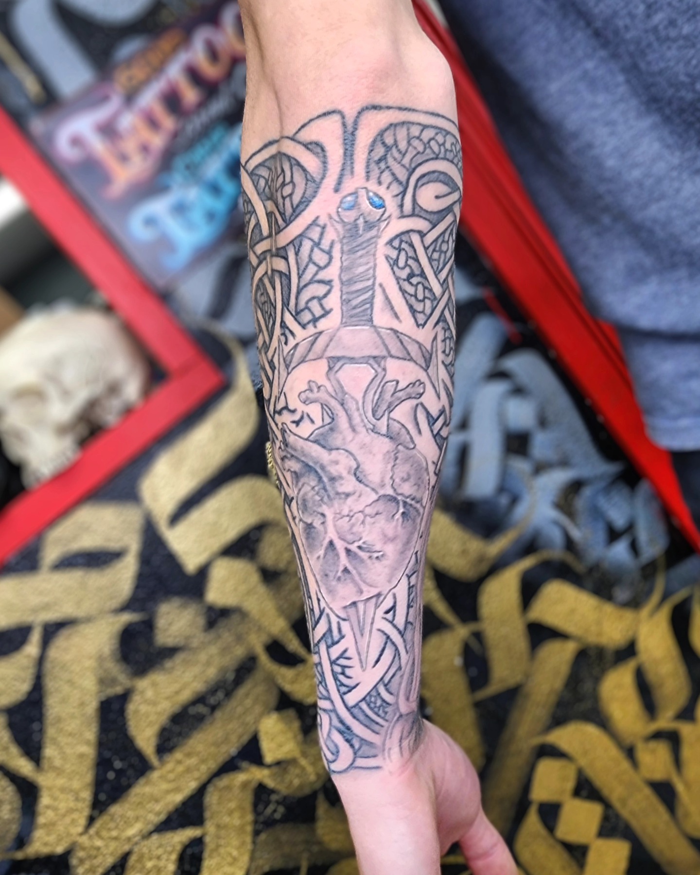 Mythical creature geometric tattoo on the forearm by Bry True