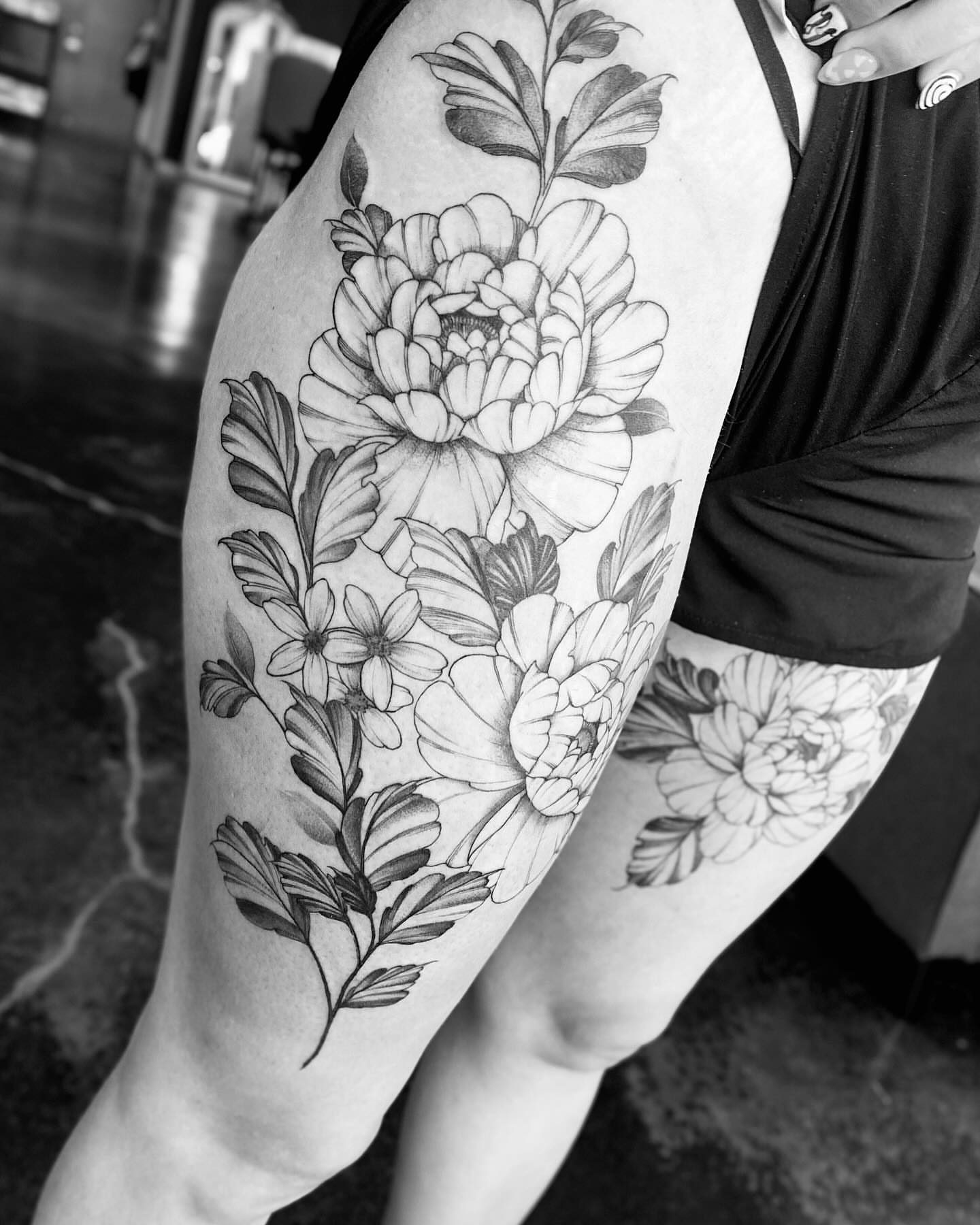 Peony flowers black and grey tattoo on the thigh by Amber Starr, Midvale, Utah