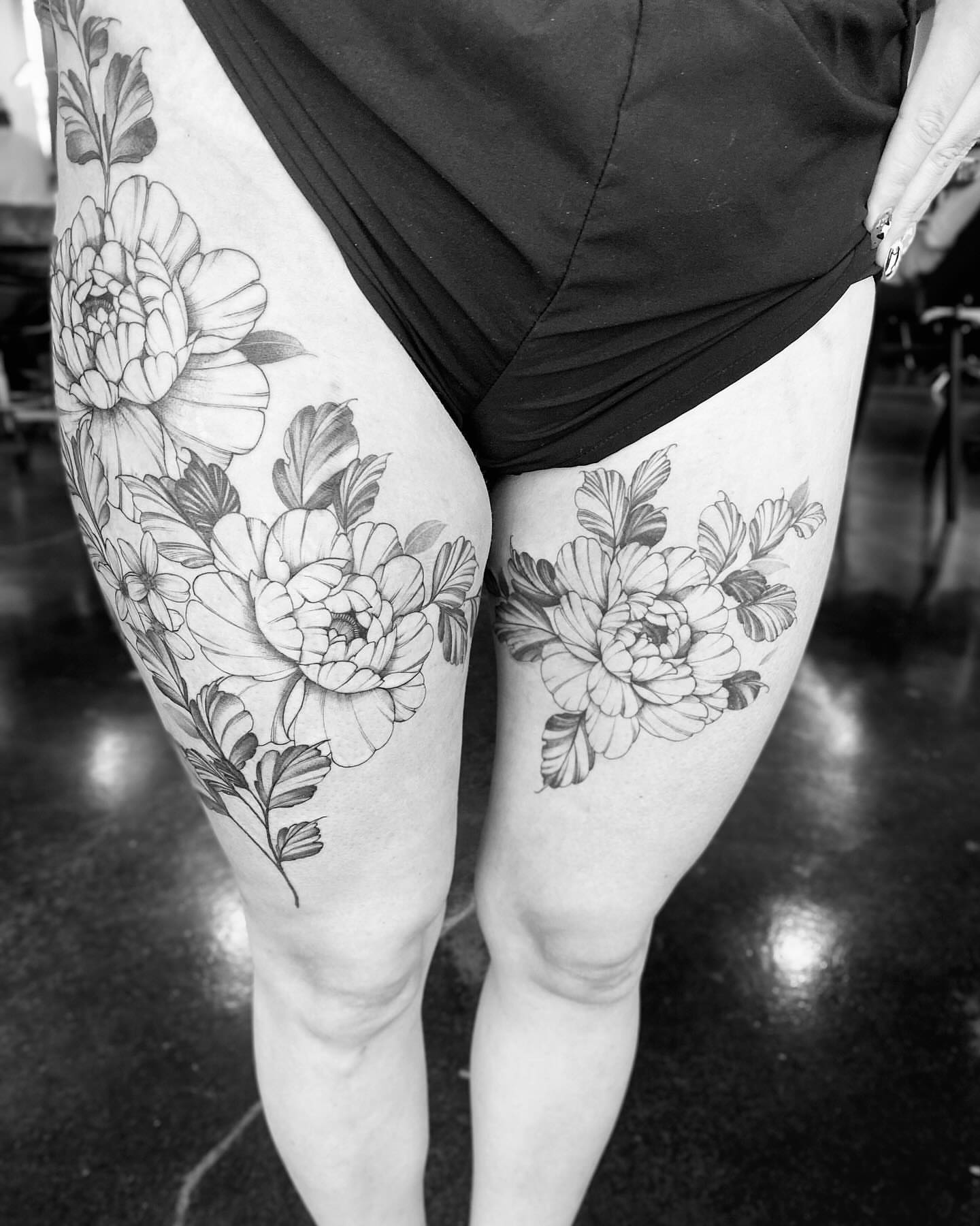 Peony flowers black and grey tattoo on the thigh by Amber Starr, Midvale, Utah