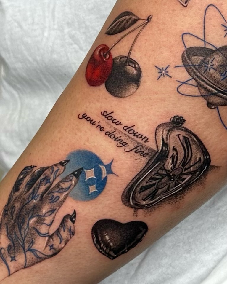 Cherry and clock realism tattoo on the forearm by Mystikal Blue Casares