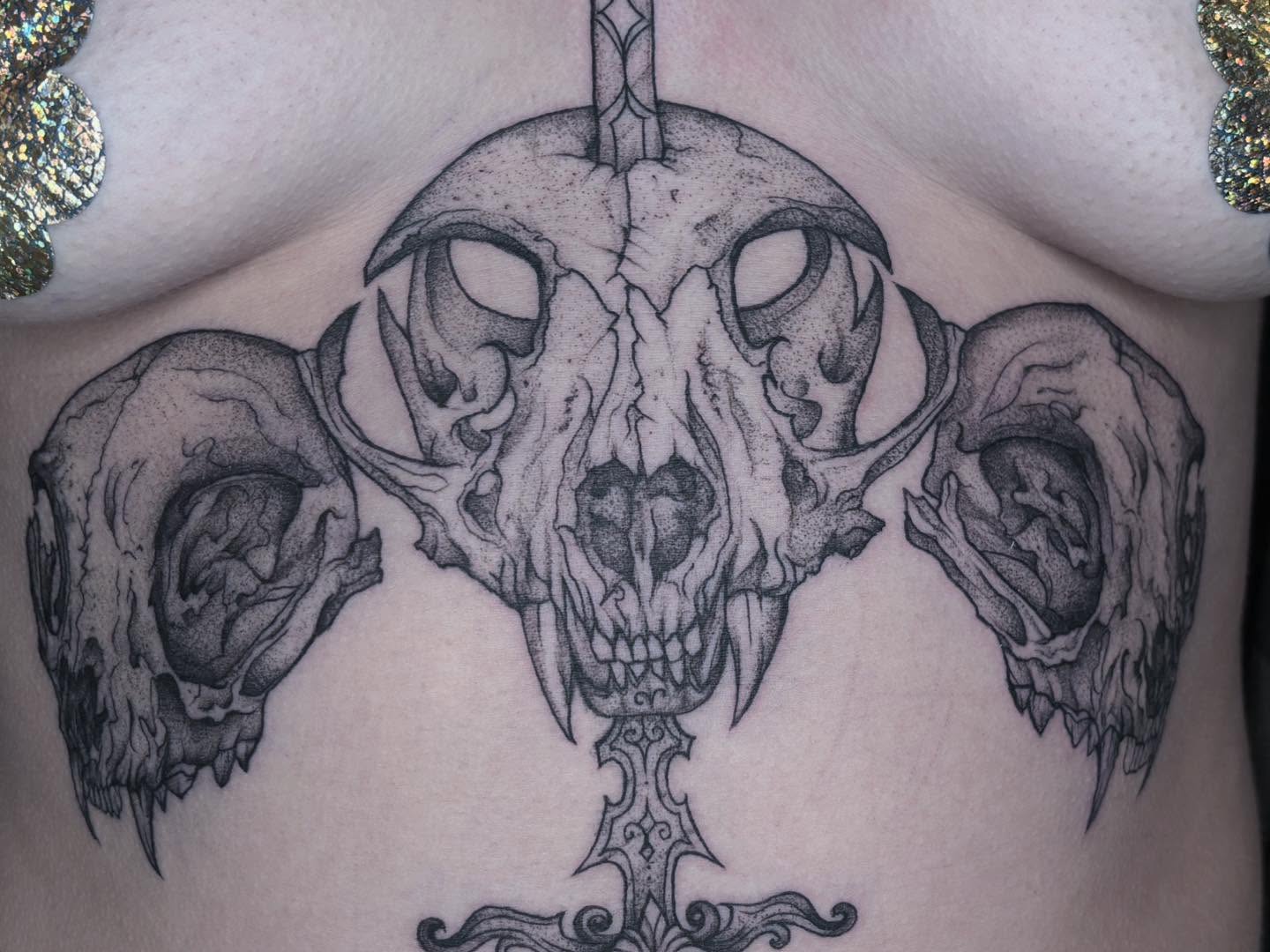 Skull dotwork tattoo on the chest by Ivanna