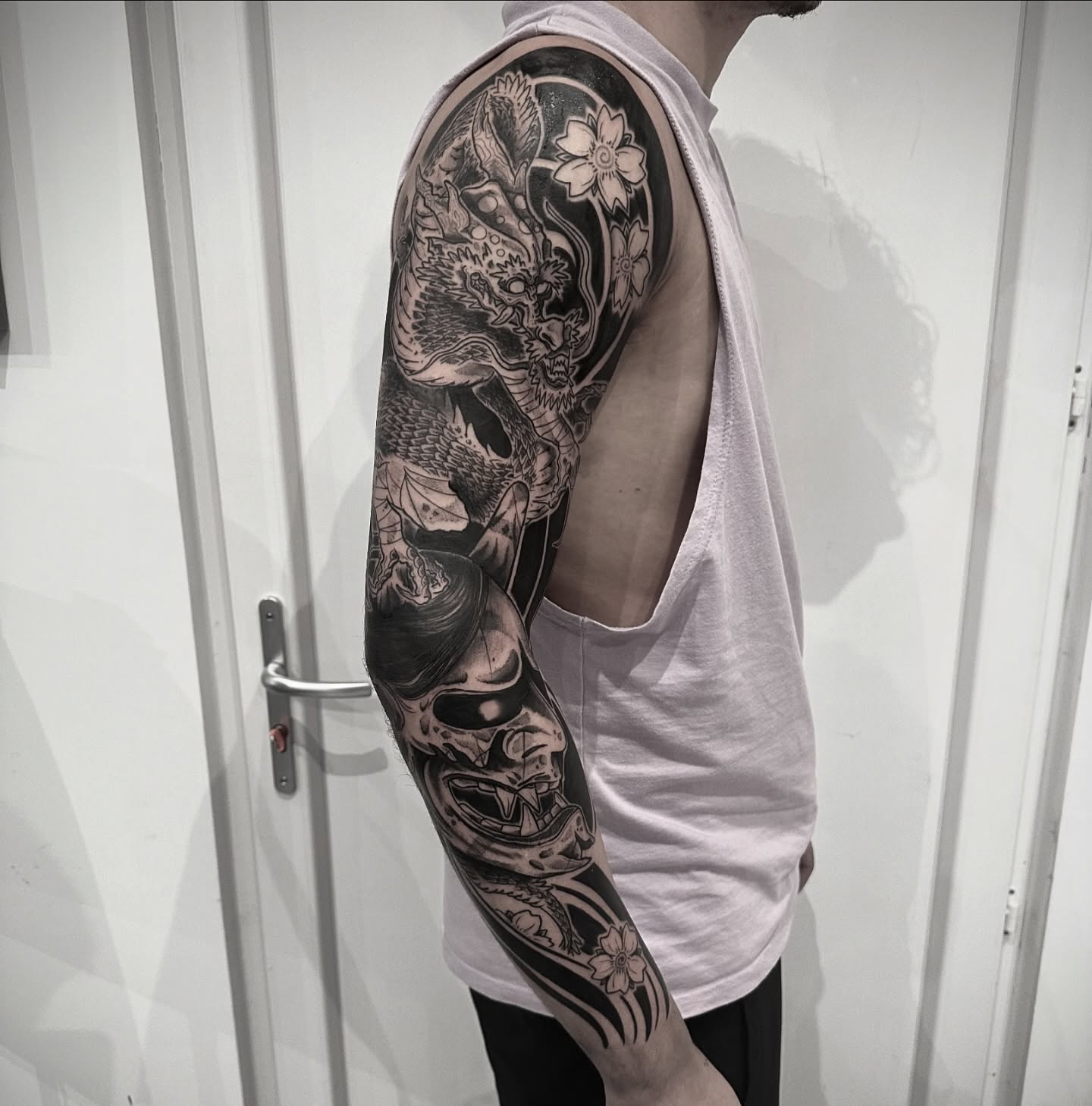 Tattoo by @tristvn_ttt — black_and_grey, realism