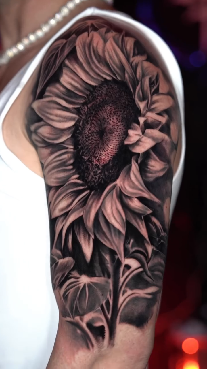 Sunflower realism tattoo by Andres García Baeza