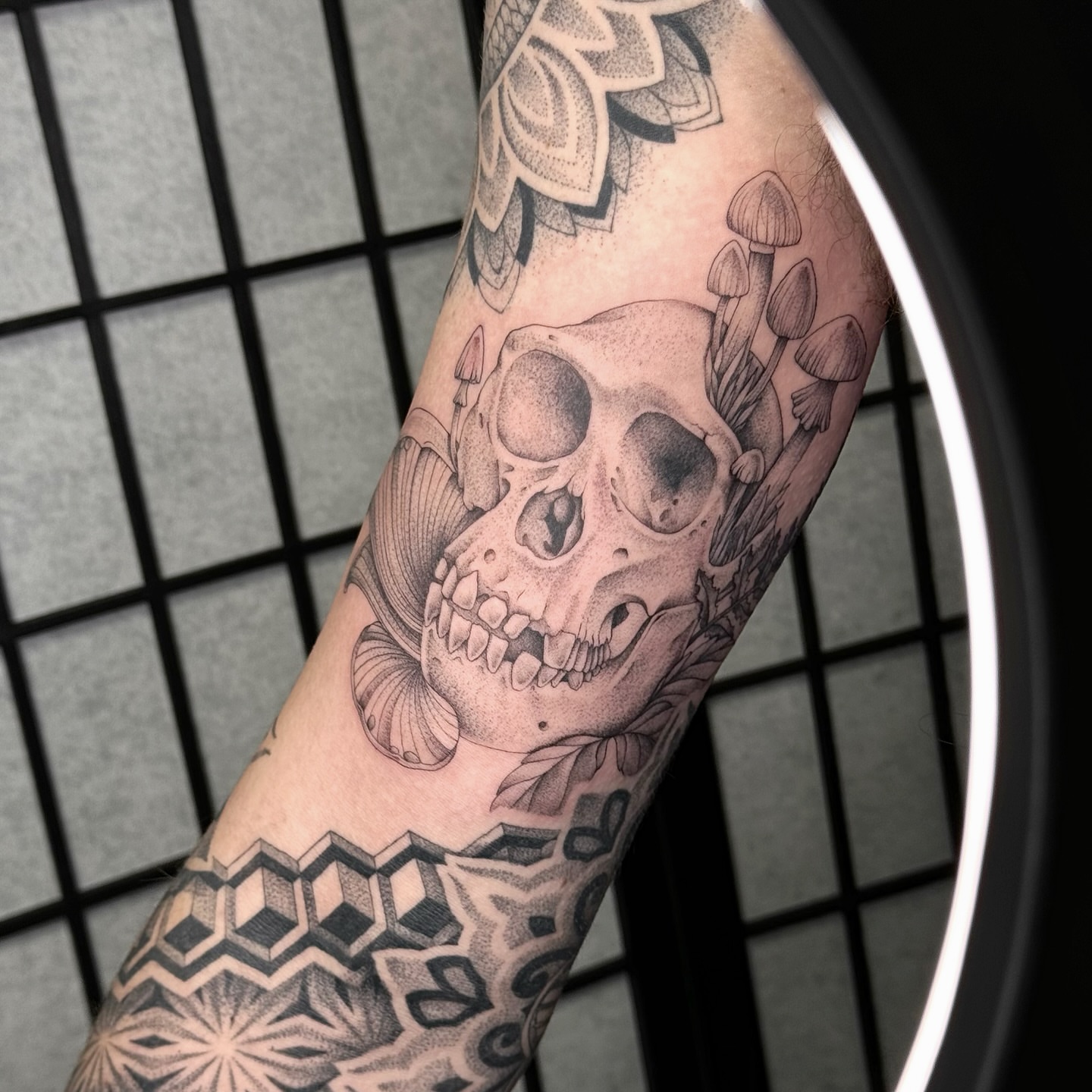 Skull and mushrooms dotwork tattoo on the forearm by MillaKas ° Tattoos
