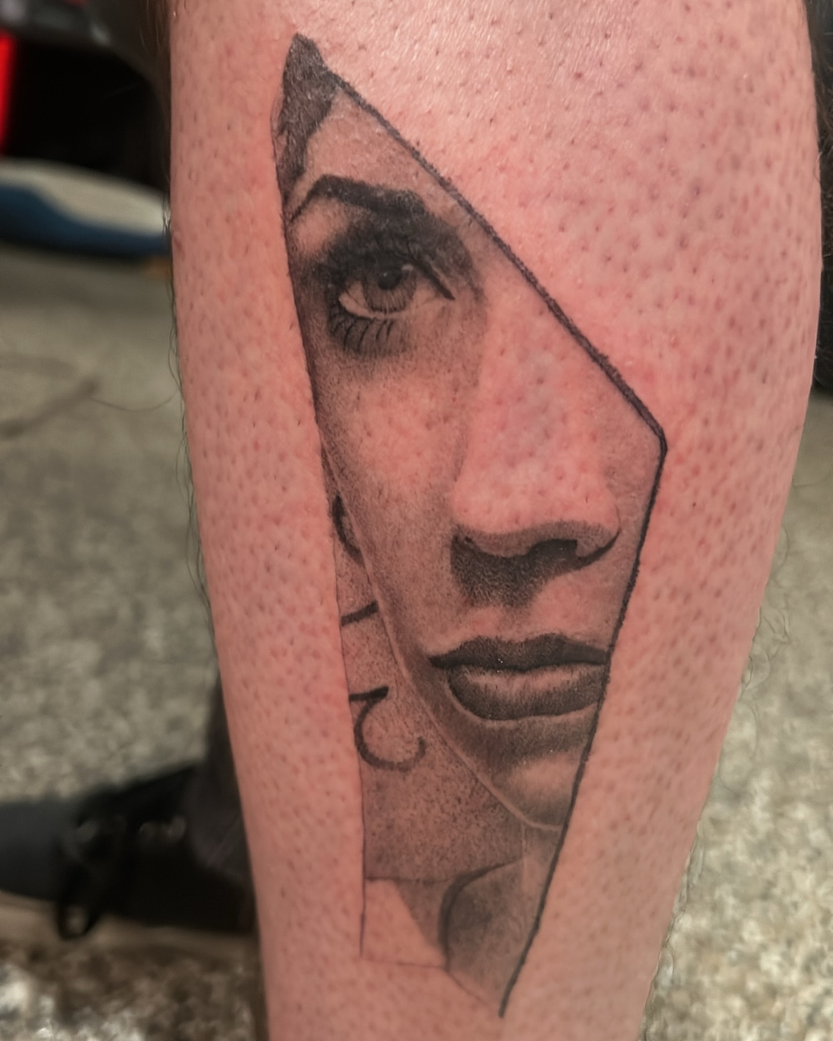 Portrait realism tattoo on the forearm by Roman Butryy