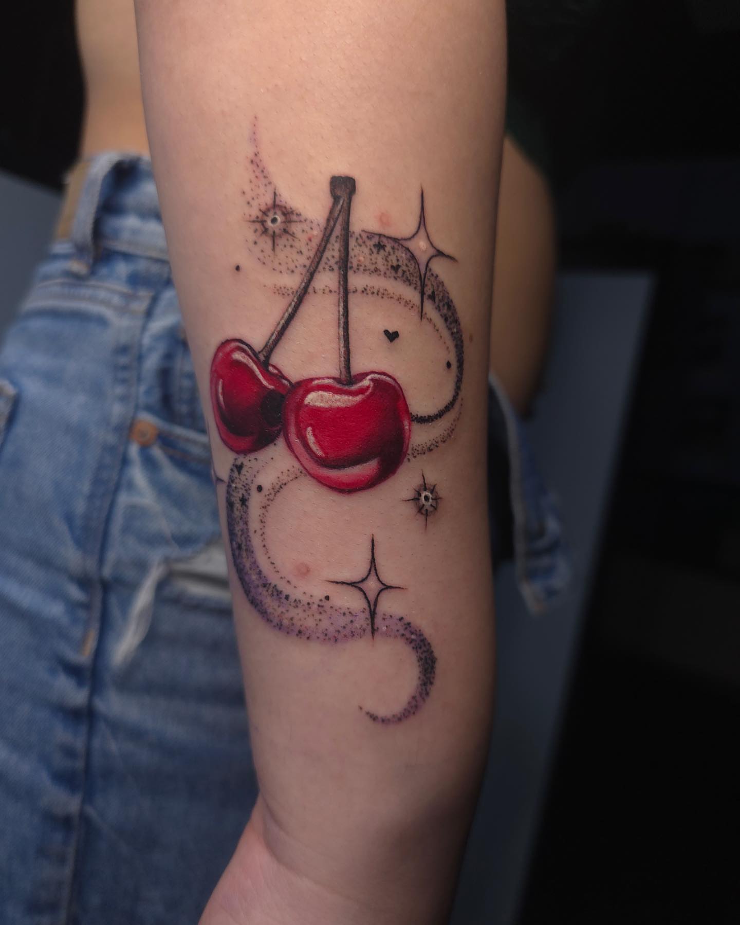Cherry dotwork tattoo on the forearm by BoogaInk