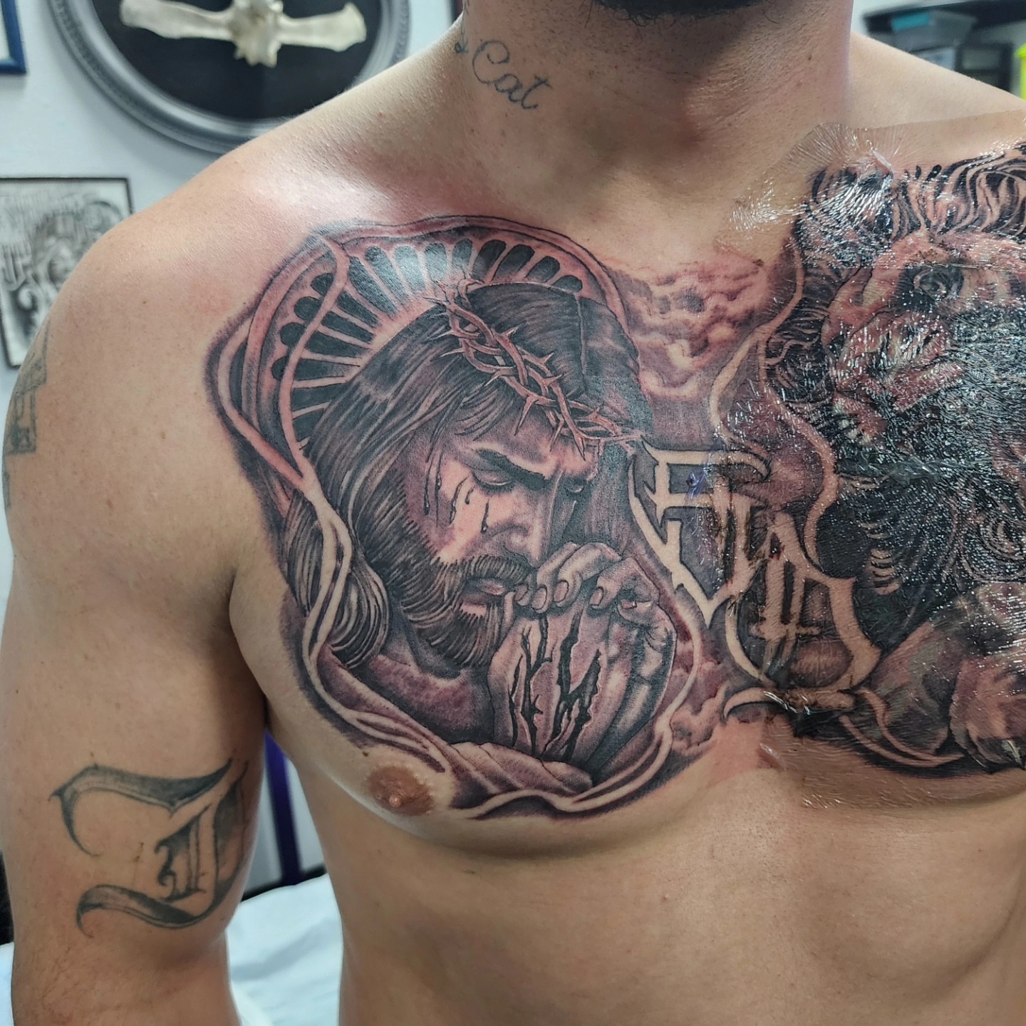Jesus Christ realism tattoo on the chest by Joe Garcia