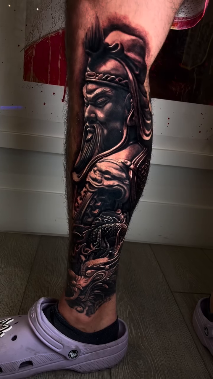 Warrior and dragon realism tattoo by Claude Steven Estrada, Las Vegas, Nevada