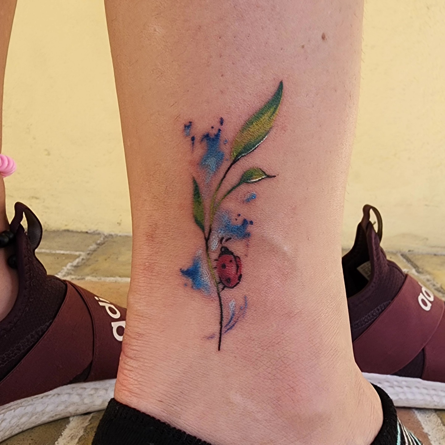 Watercolor flower watercolor tattoo on the calf by ✨Vii Duquette✨