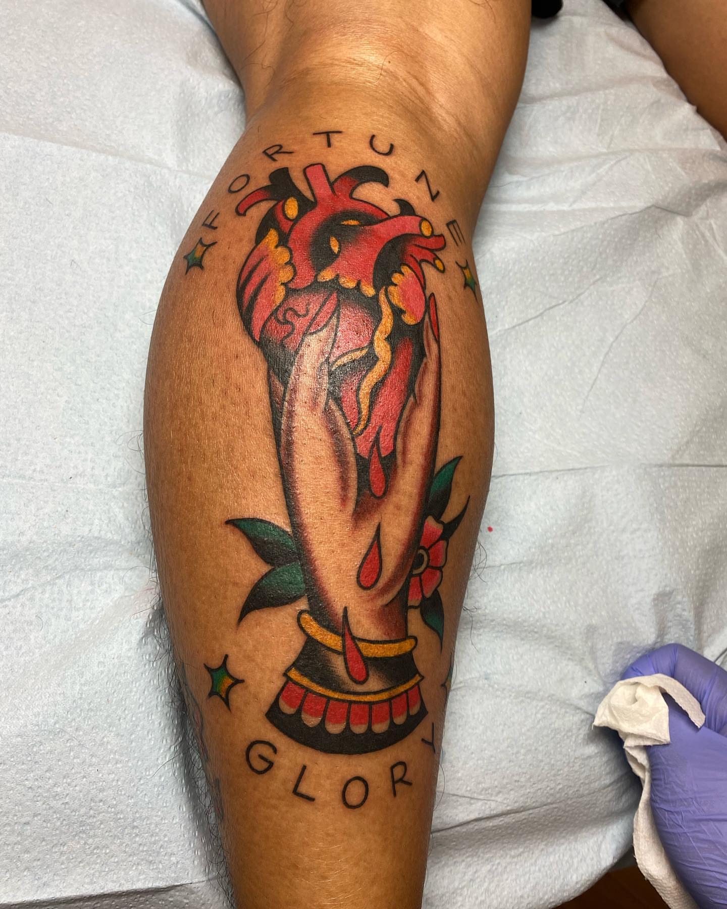 Heart and hand American traditional tattoo on the forearm by Alan Pham, San Jose, California