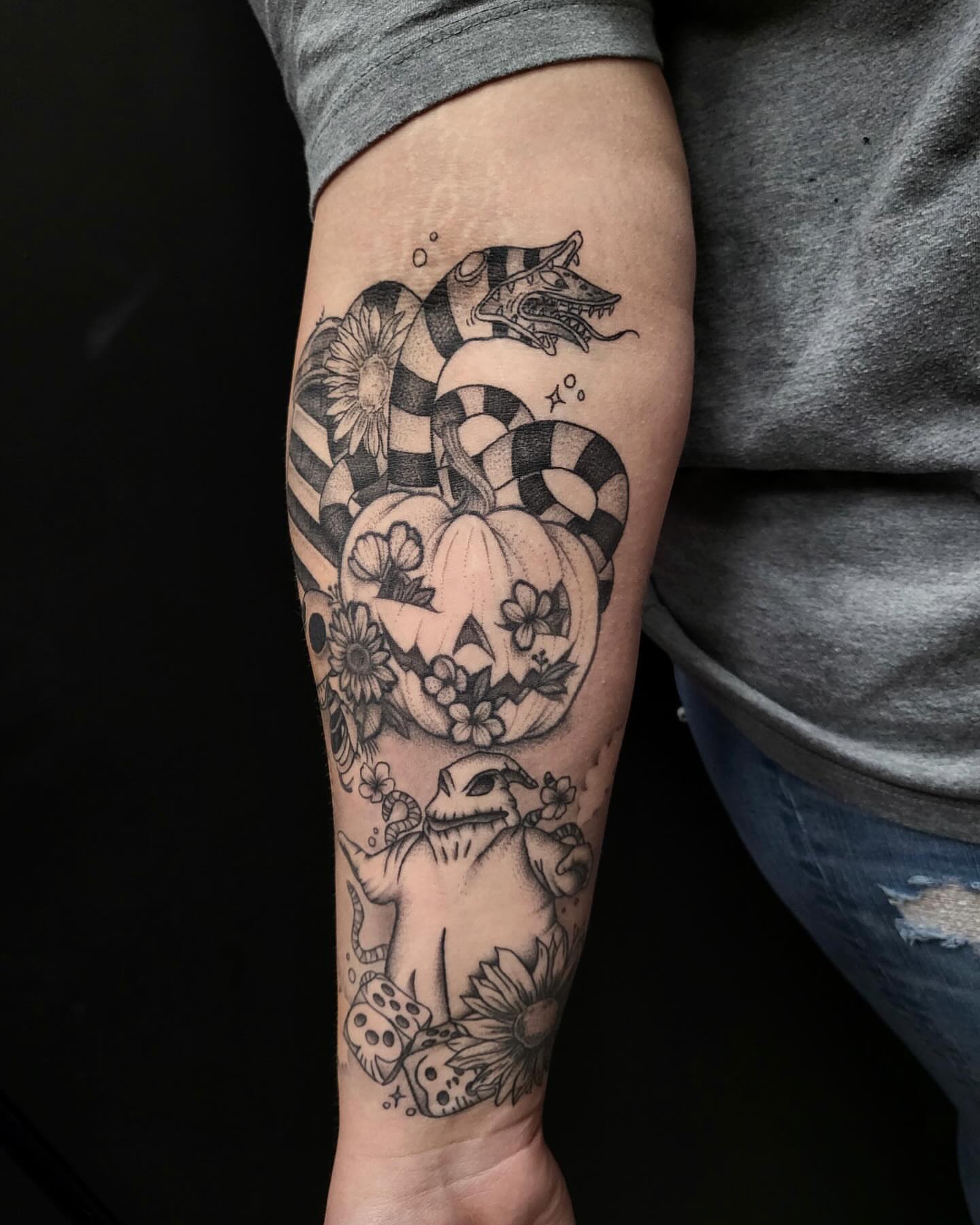 Pumpkin and snake American traditional tattoo on the forearm by Diana Guillette