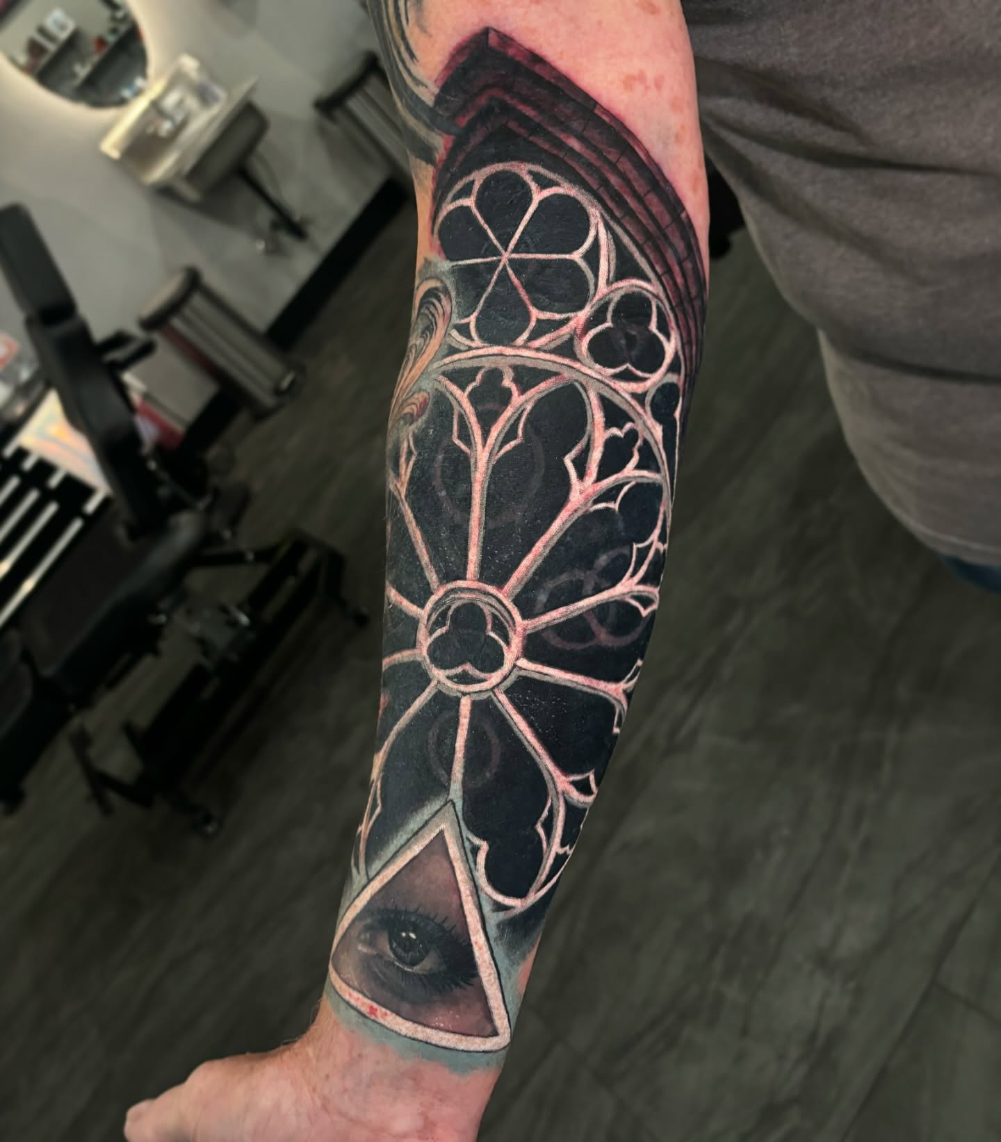 Eye and stained glass geometric tattoo on the forearm by 🦇𝖀𝖙𝖆𝖍🦇, Las Vegas, Nevada